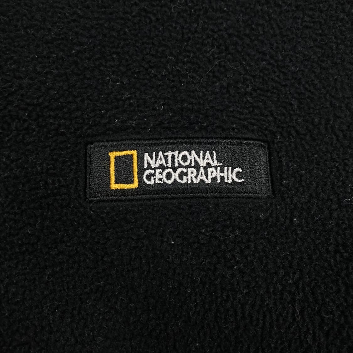 내셔널 지오그래픽 블랙 컬러 스몰 로고 하프 집업 플리스 상품이미지2