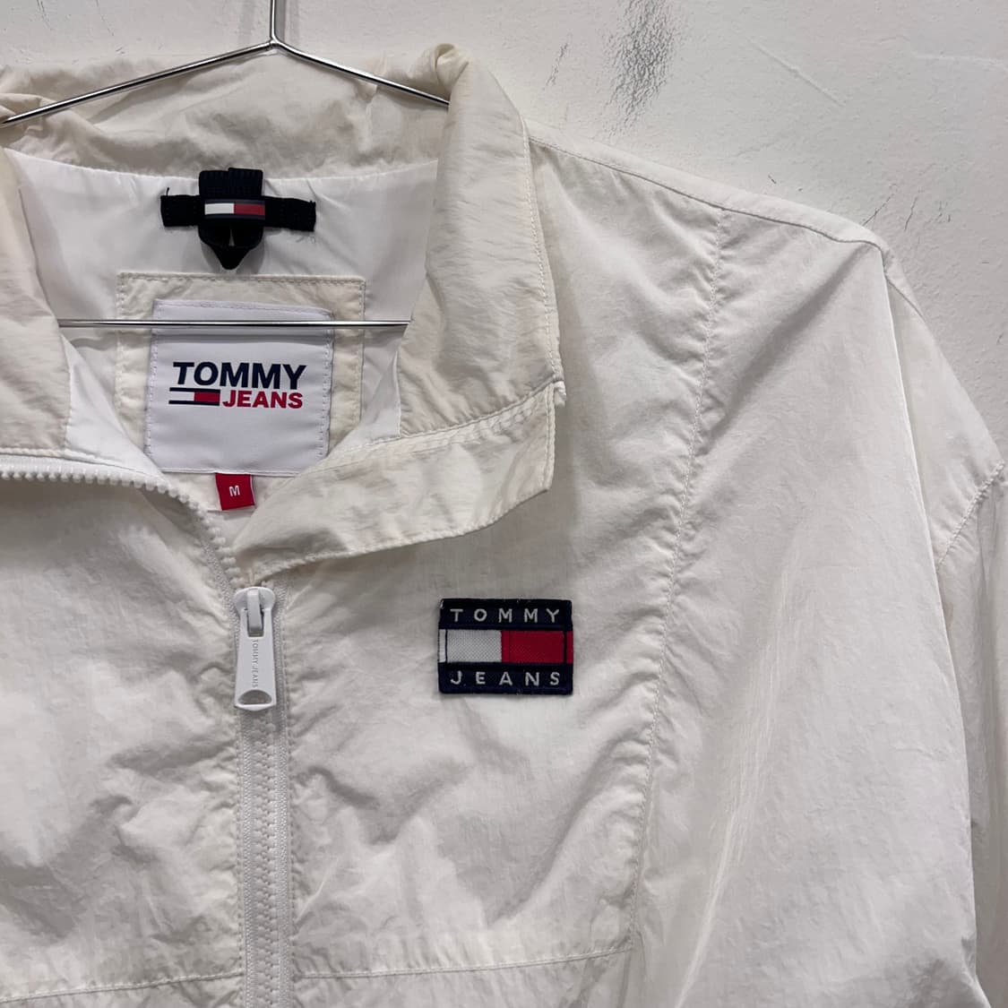 타미 진스 와펜로고 하이넥 크롭 바람막이 상품이미지1