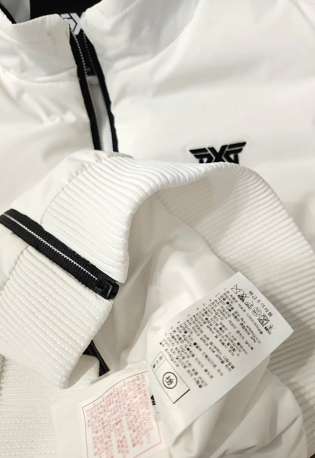 (새상품)PXG 스윙다운 하이브리드 구스니트 베스트 상품이미지8