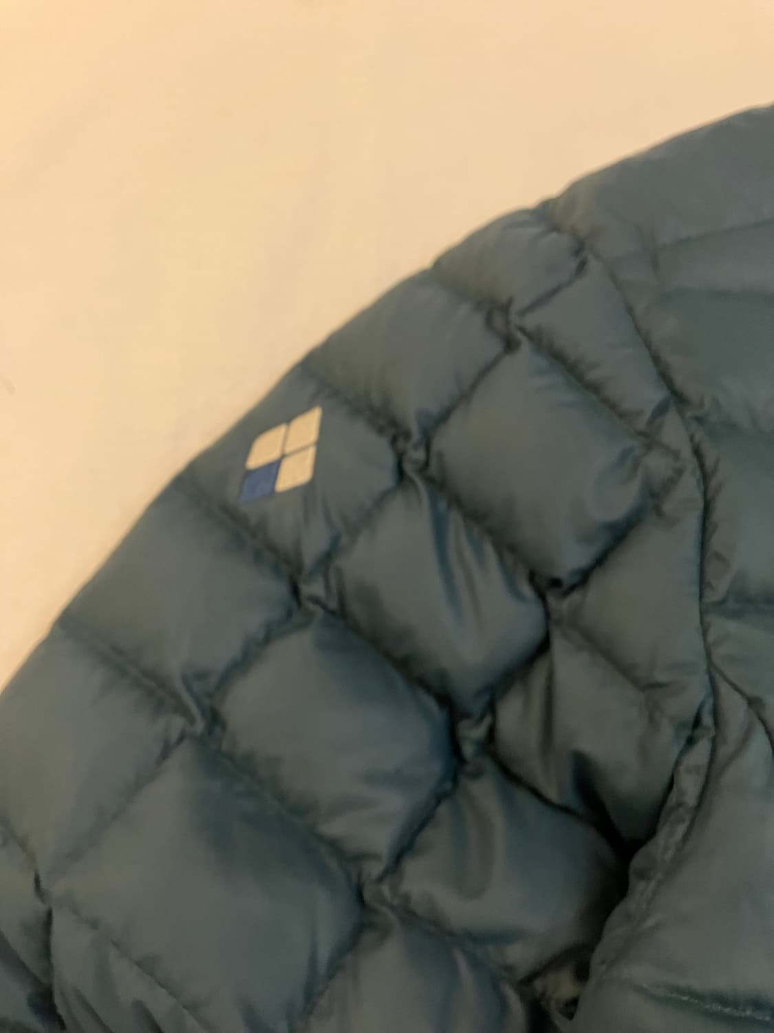 몽벨 제나 구스다운 바둑판 경량패딩 그린 상품이미지3