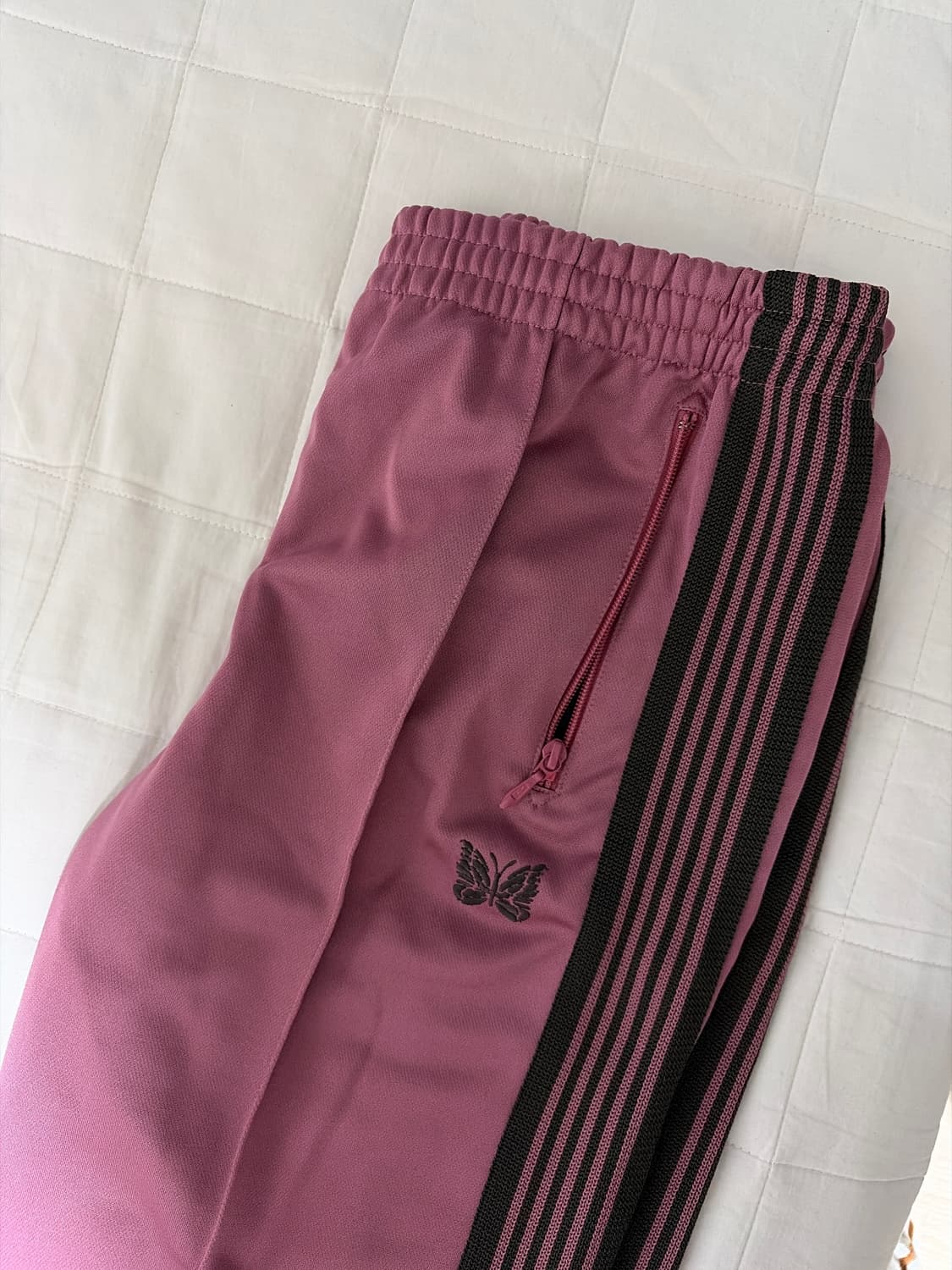 니들스 트랙팬츠 스모키핑크 상품이미지1