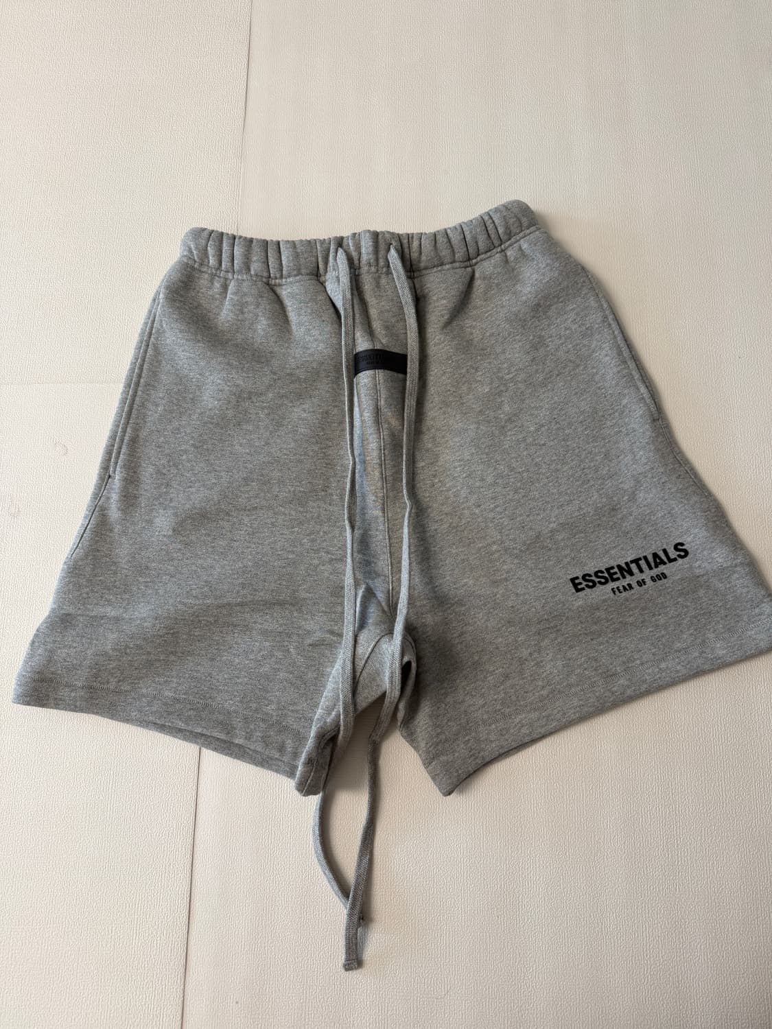 에센셜 다크오트밀 쇼츠 XS 상품이미지1