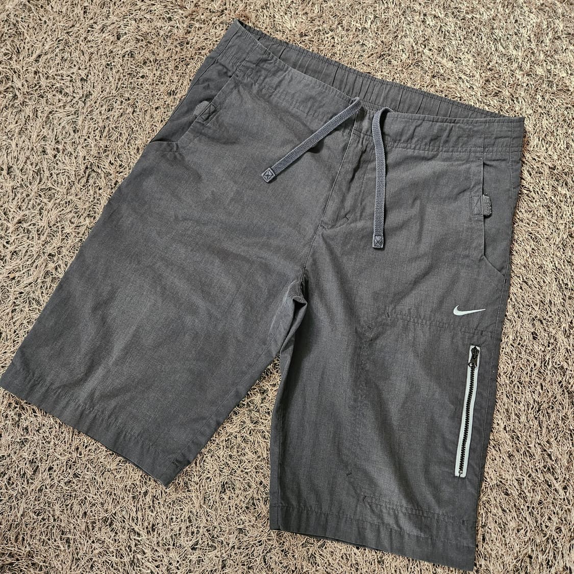 나이키(Nike) 코튼 나일론 혼방 지퍼 포켓 반바지 상품이미지1