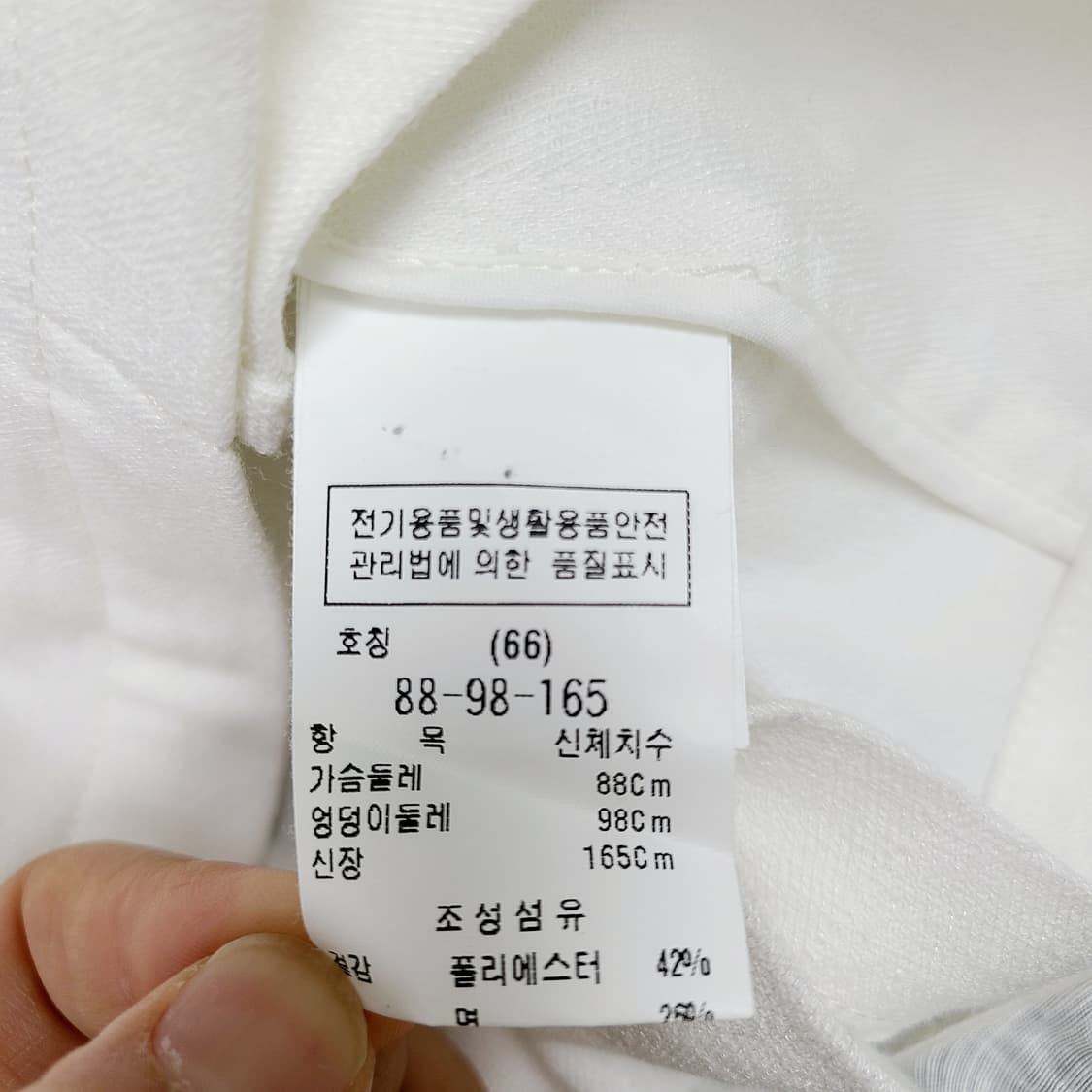 듀엘(DEWL) 화이트 보석 버튼 크롭 자켓 (66) 상품이미지7