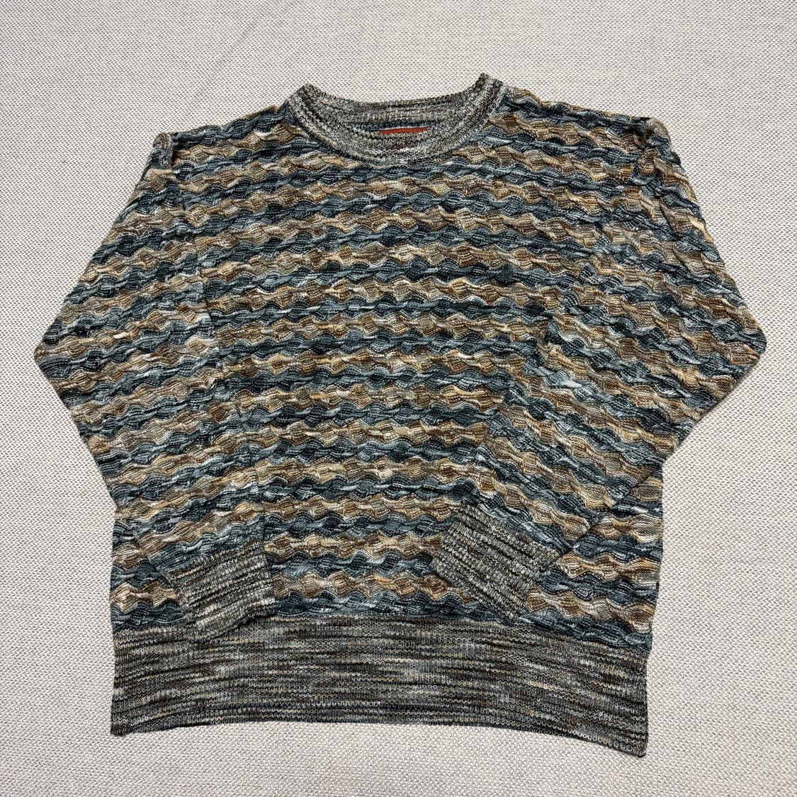 미쏘니 패턴 케이블 니트 스웨터 상품이미지1