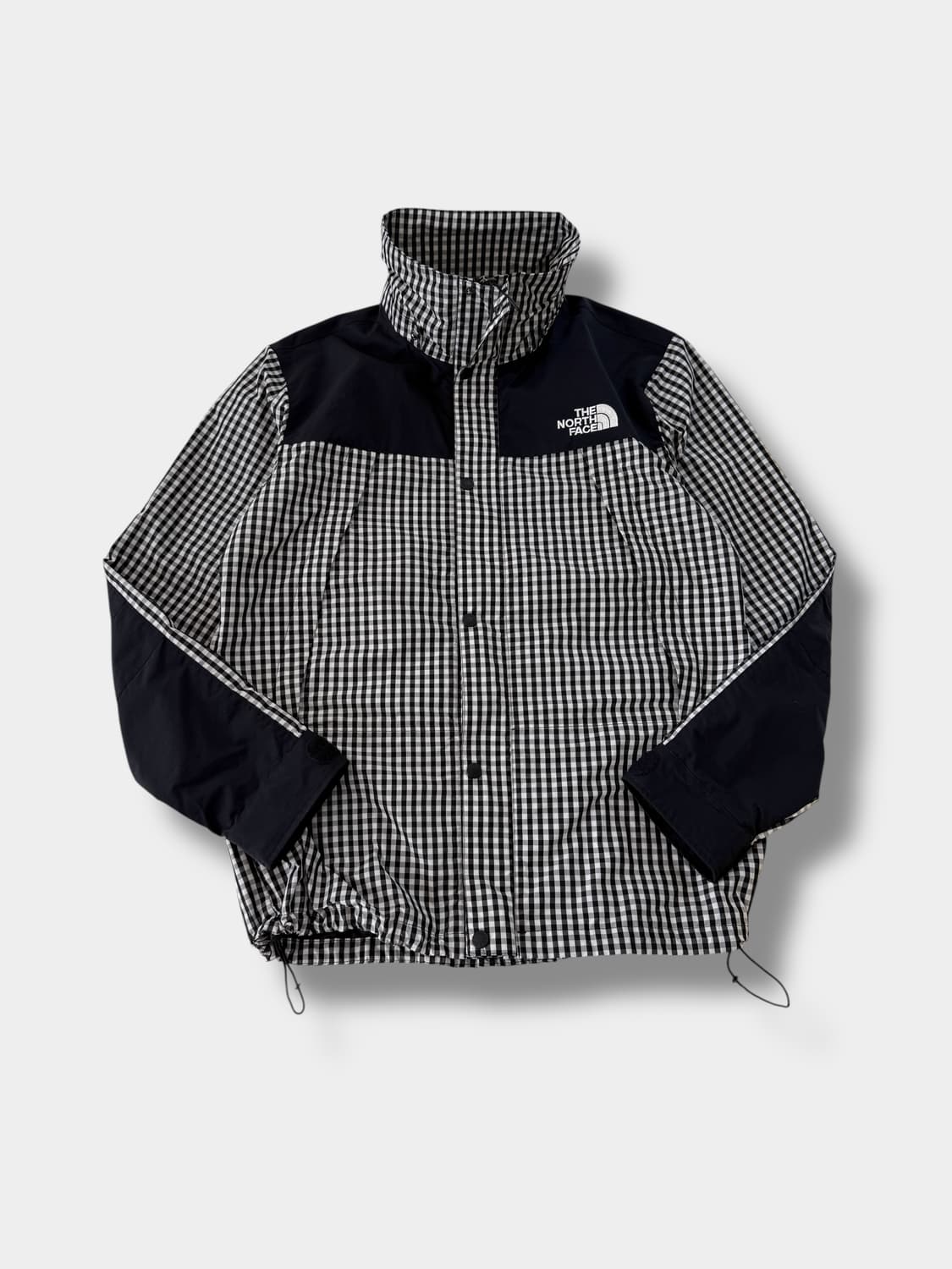 노스페이스 루즈핏 체크 패턴 나일론 바람막이 자켓 상품이미지1