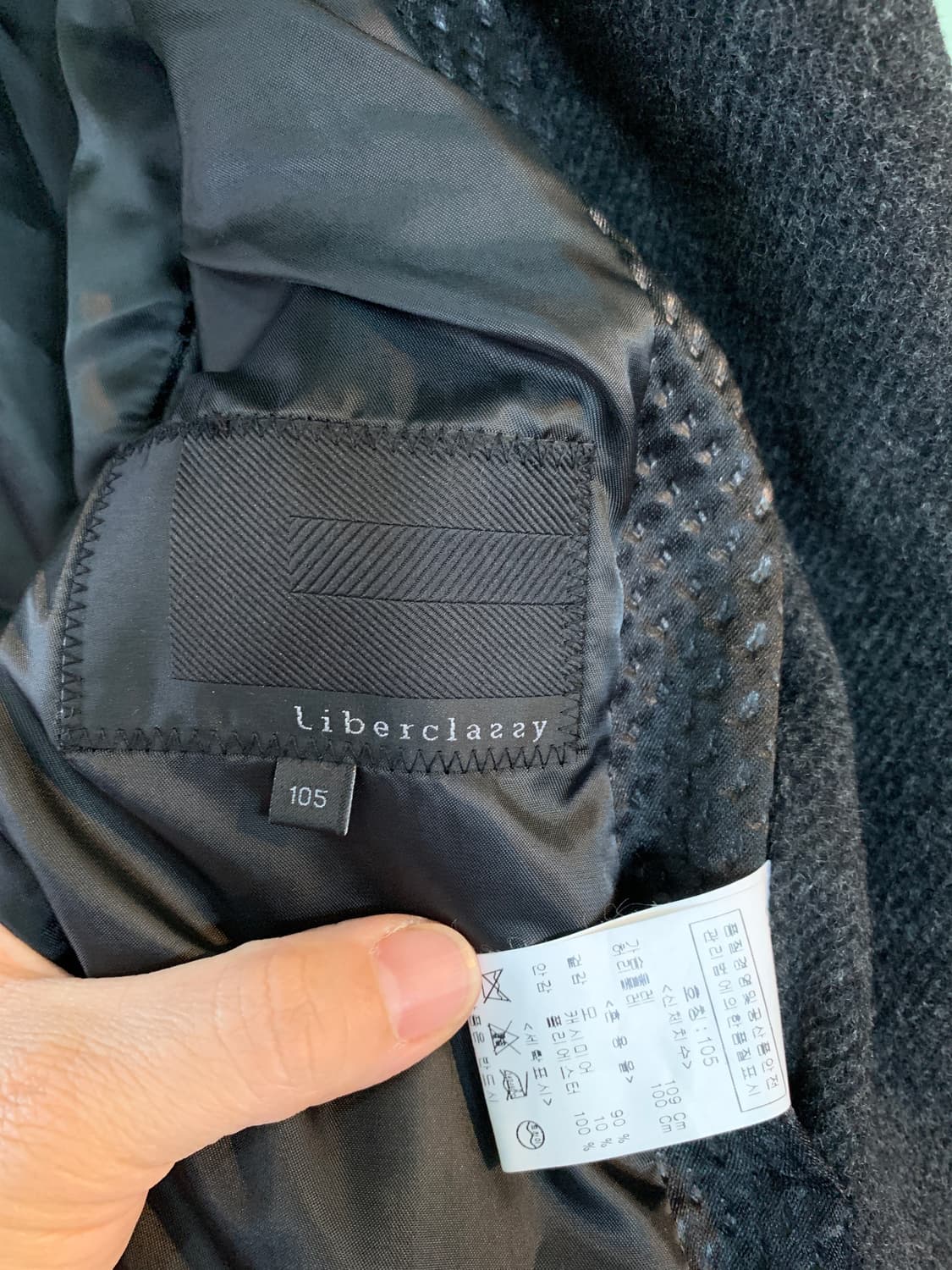 리버클래시의 감각적인 미니멀 울 코트 상품이미지2