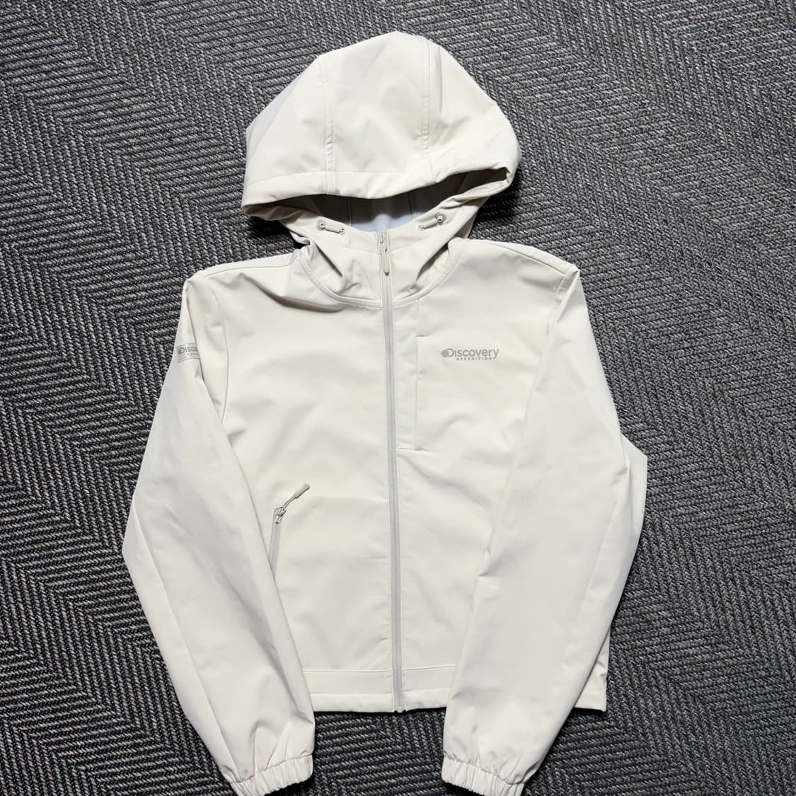 디스커버리 아이보리 후드 바람막이(85) 상품이미지1