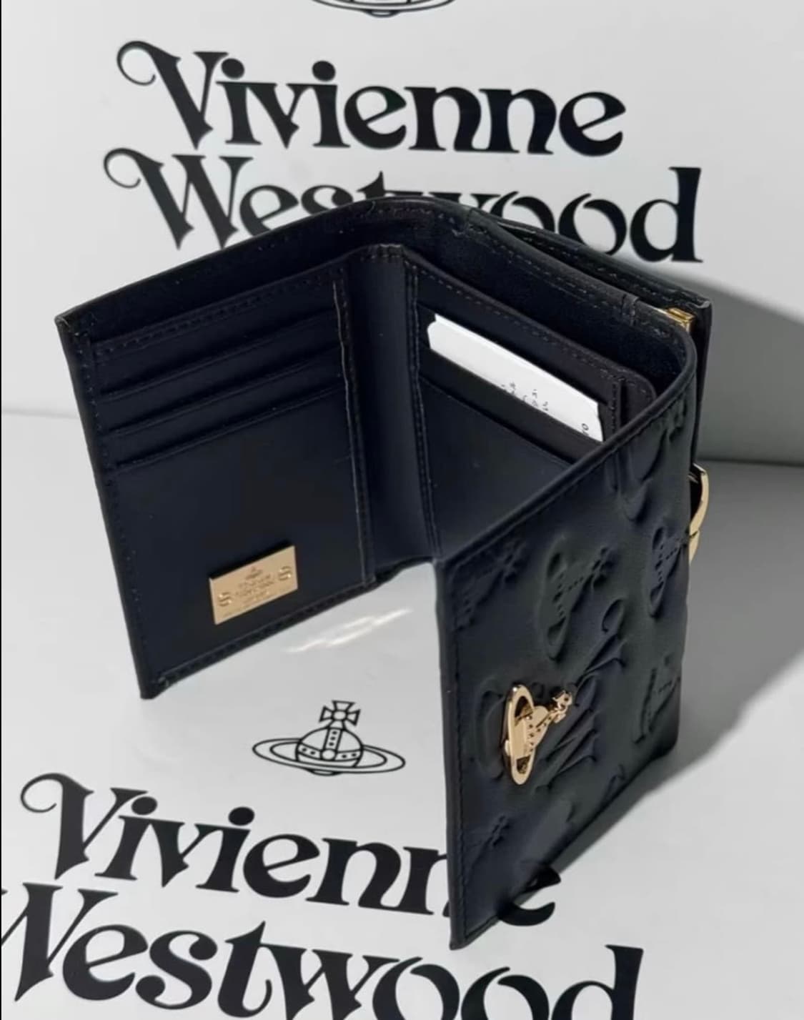 비비안웨스트우드 아카이브 금장 orb 펀칭 유광 블랙레더 하프월렛 반지갑 상품이미지6
