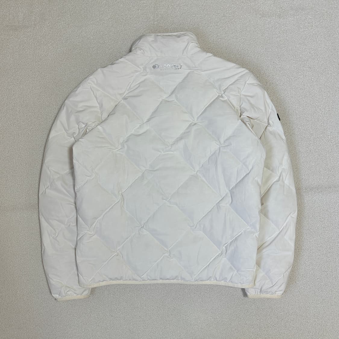 디스커버리 익스페디션 디하스 하이넥 튜브 구스다운 경량패딩 상품이미지3