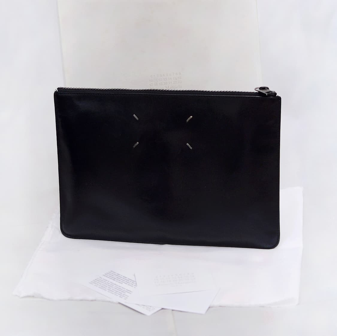 메종 마르지엘라 스티치&11넘버링 로고 양면 클러치백 상품이미지1