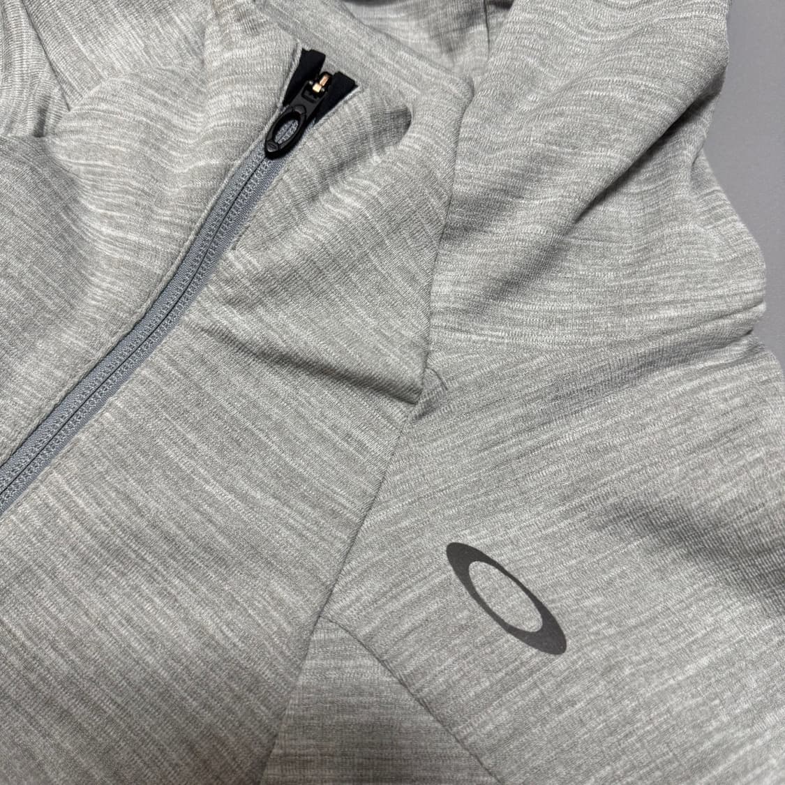 오클리 멜란지컬러 폴리에스터 혼방 테크 서클로고 구버전 후드 집업 자켓 상품이미지4