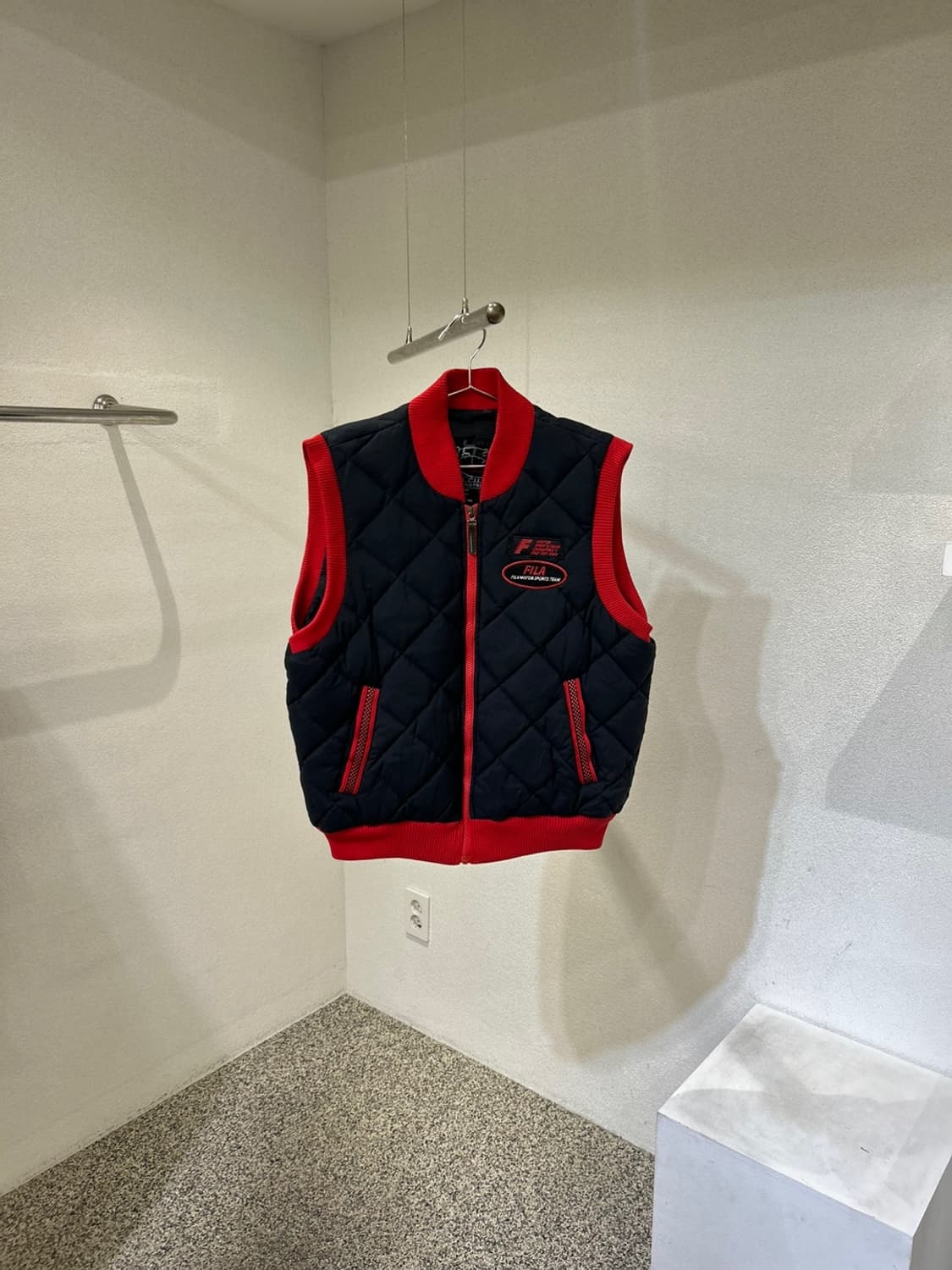 휠라 퀄팅 조끼패딩 상품이미지1