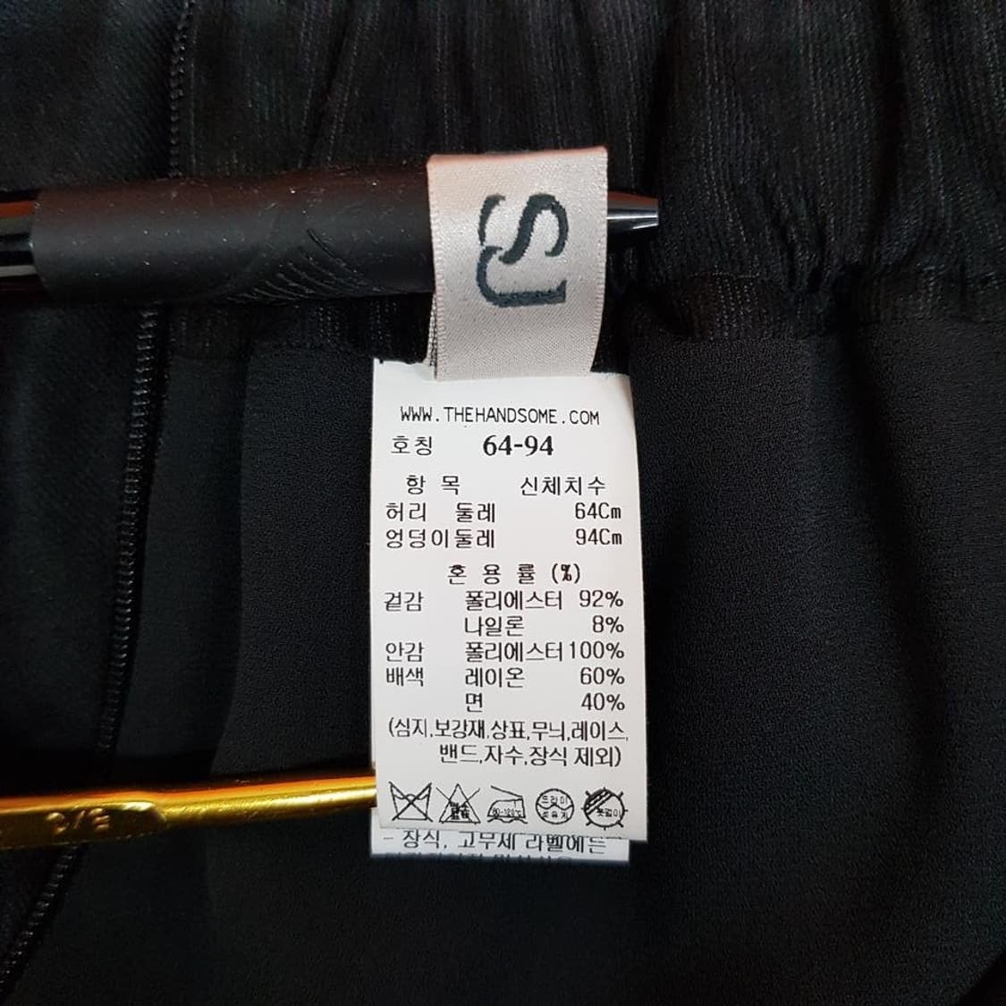 한섬 SJSJ 2023 턱 슬릿 플레어 스커트 64-94사이즈 상품이미지9