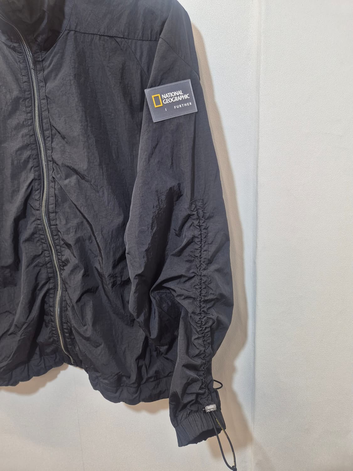 내셔널지오그래픽  블랙 바람막이  xs
사이즈  상품이미지2