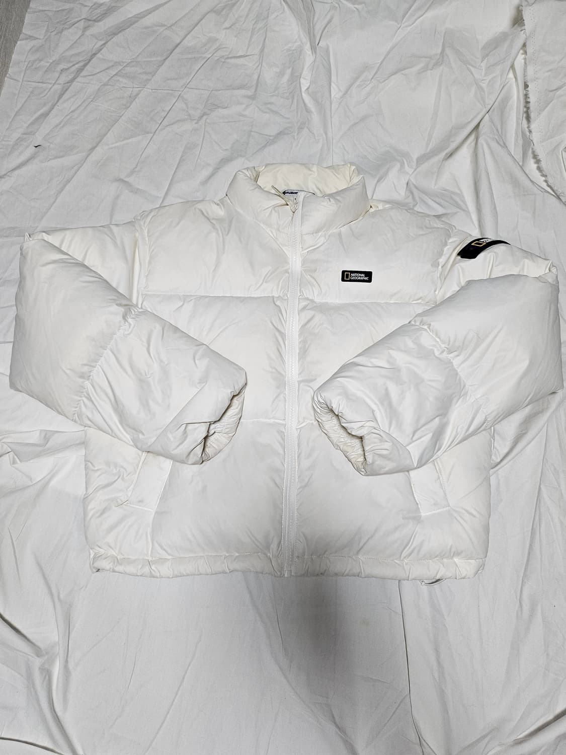 내셔널지오그래픽 숏 패딩 화이트 M 상품이미지1