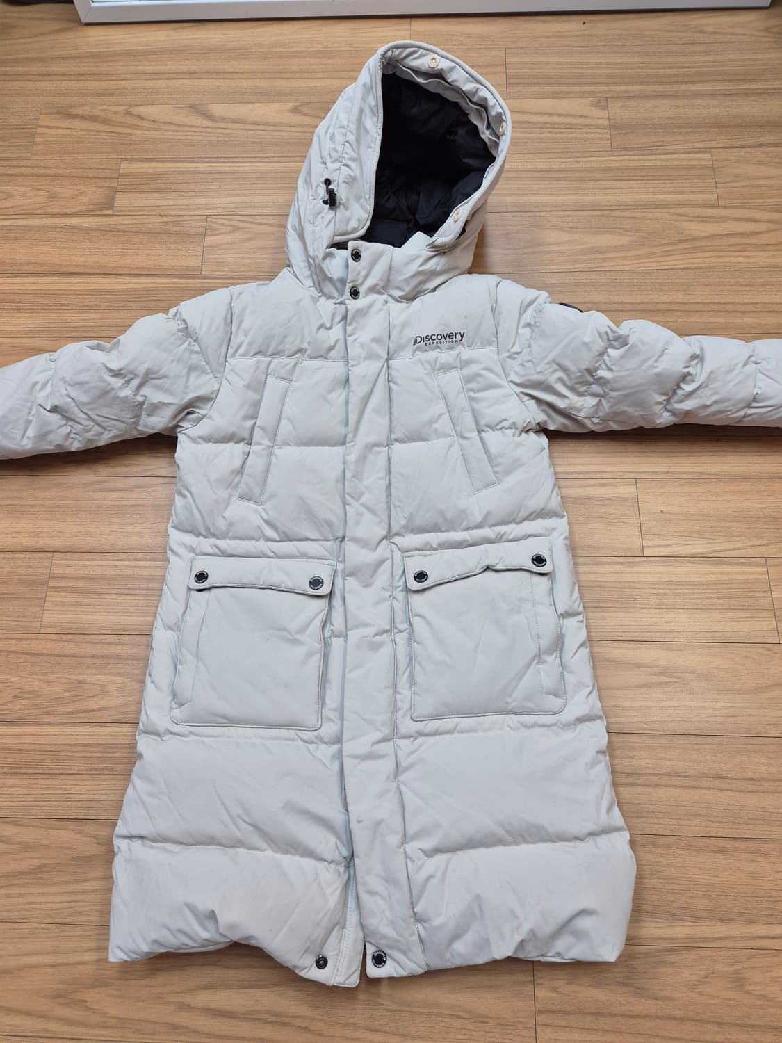 디스커버리 익스페디션 키즈 롱패딩 아이보리 색상입니다. 사이즈는 130입 상품이미지1