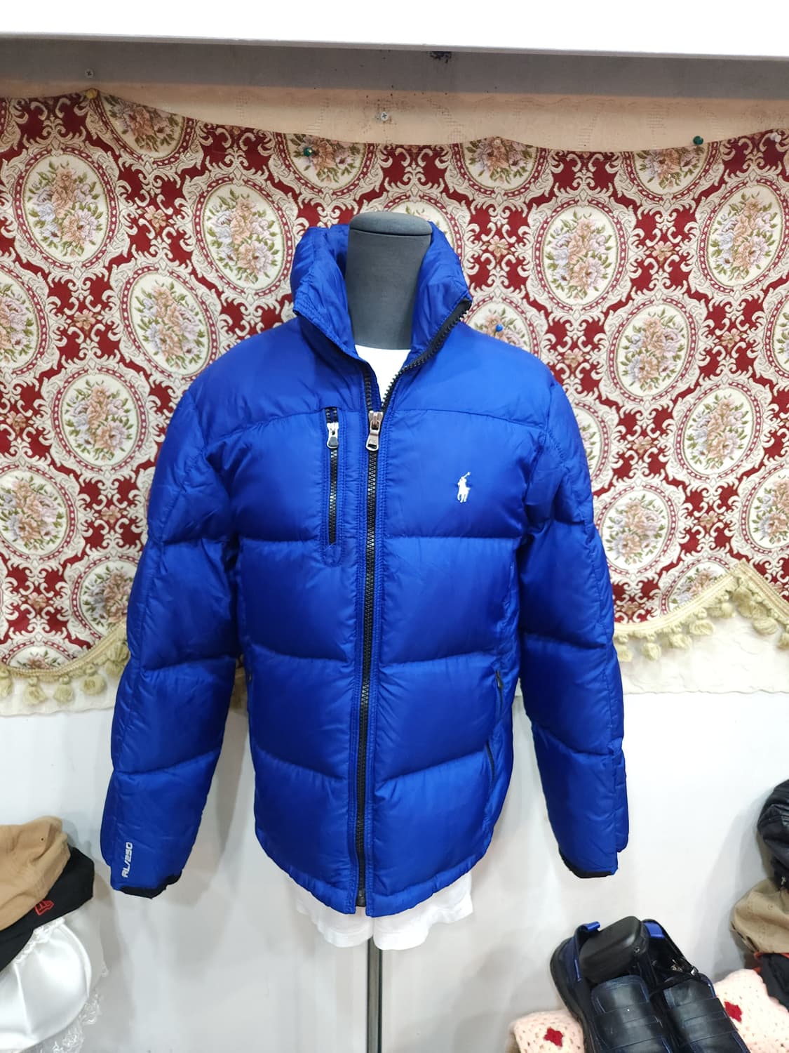 폴로 랄프로렌 블루 오리털 패딩점퍼
​
 상품이미지1