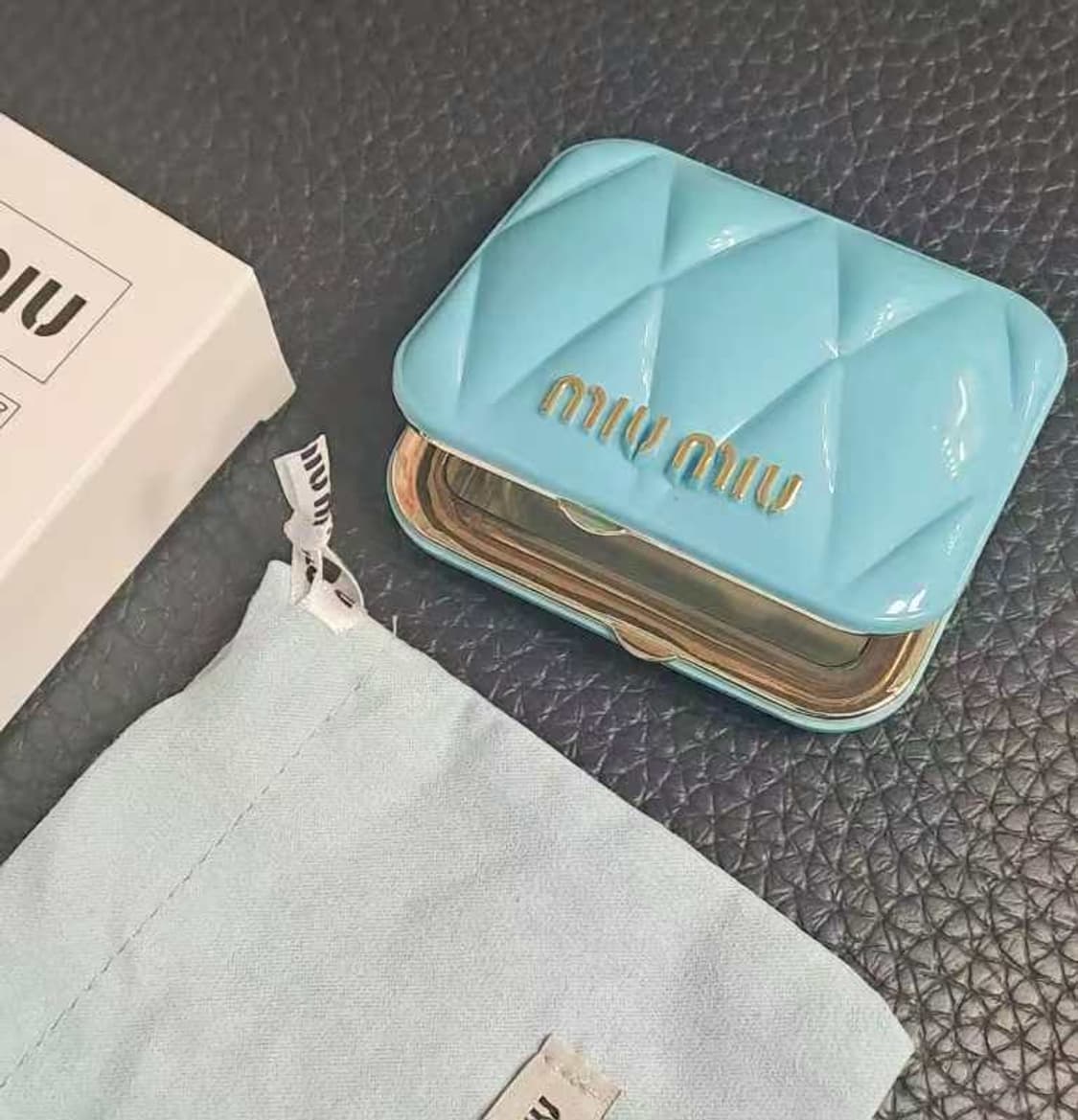 MIUMIU 미우미우 양면손거울 상품이미지1