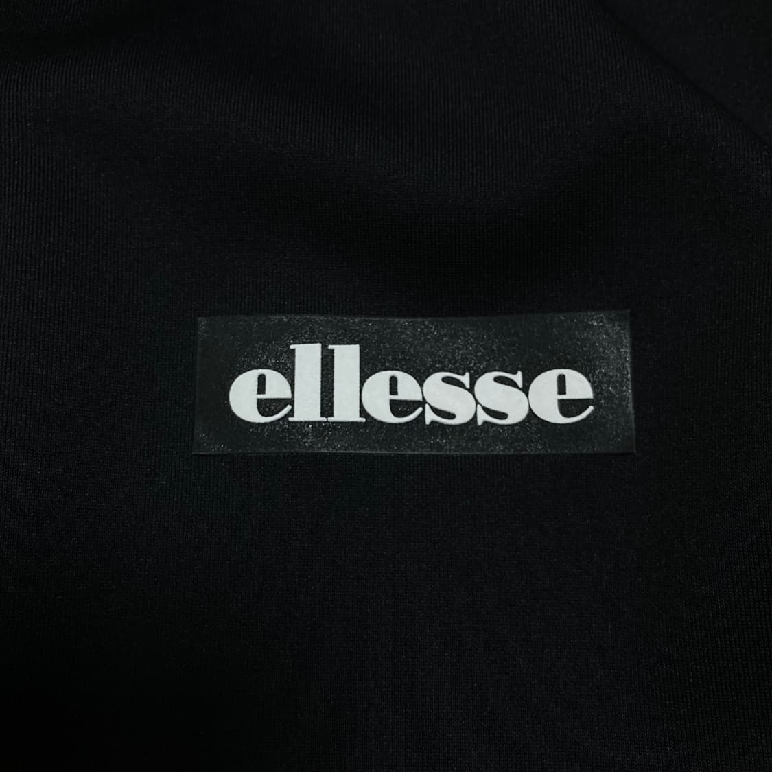 엘레쎄 스몰 로고 사이드 라인 블랙 트랙탑 상품이미지2