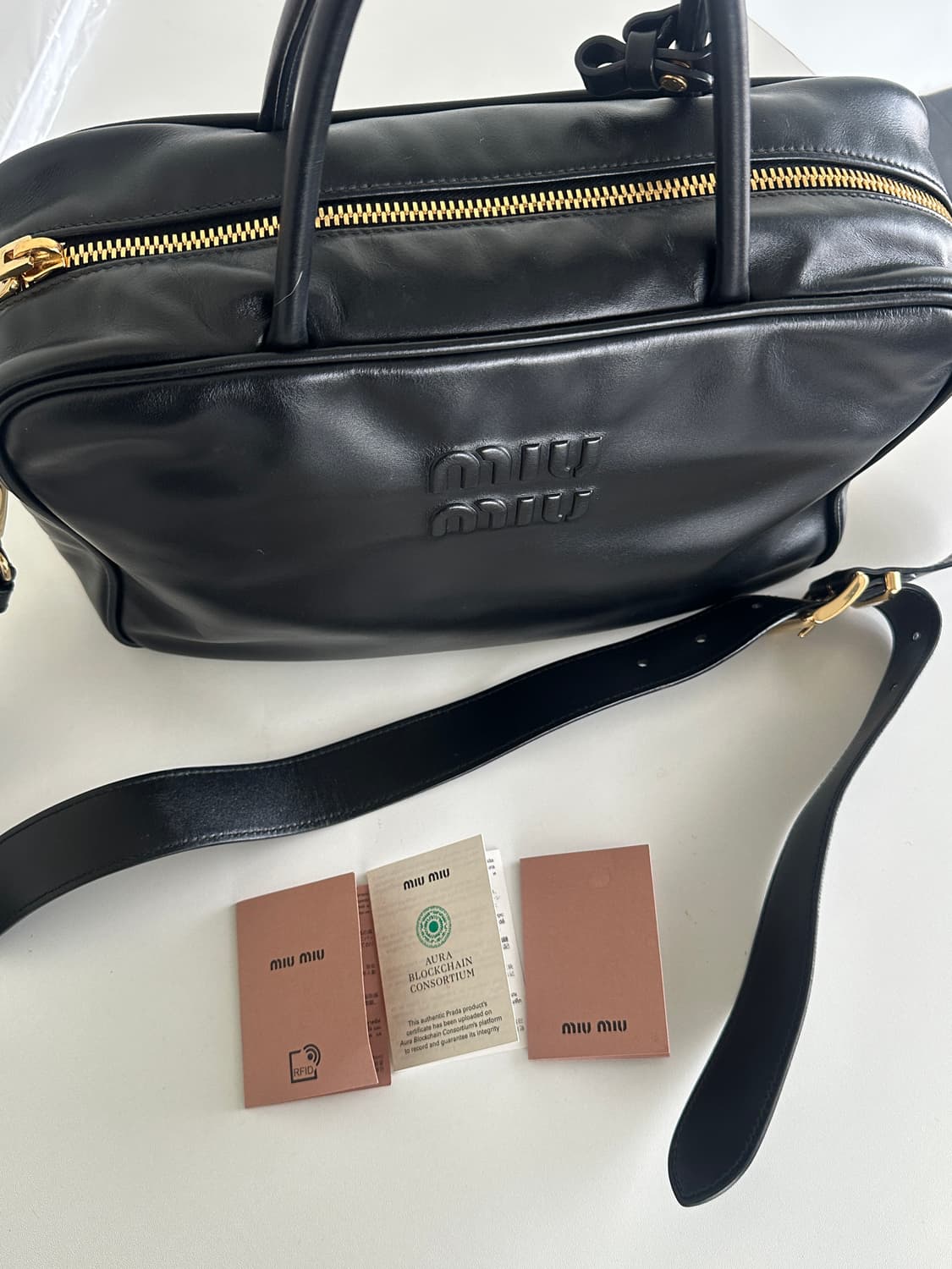 미우미우 가죽 탑 핸들 보백 상품이미지1