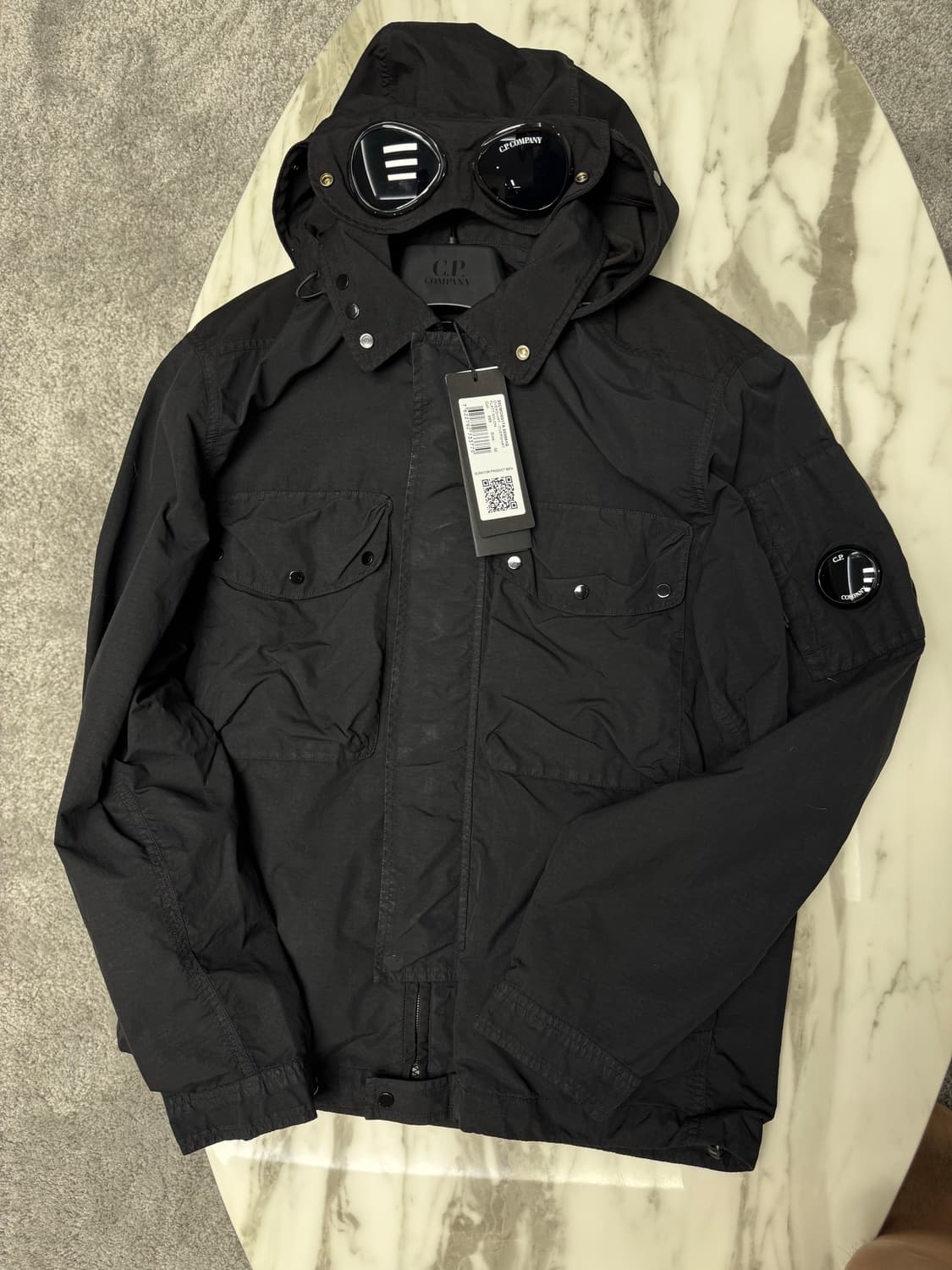 cp컴퍼니 26ss 플랫나일론 고글자켓 바람막이 상품이미지1