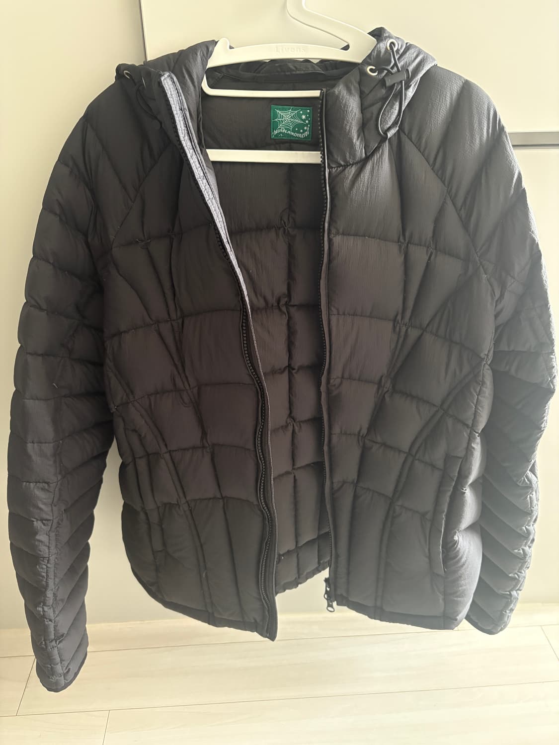 더콜디스트모먼트 경량패딩 상품이미지1