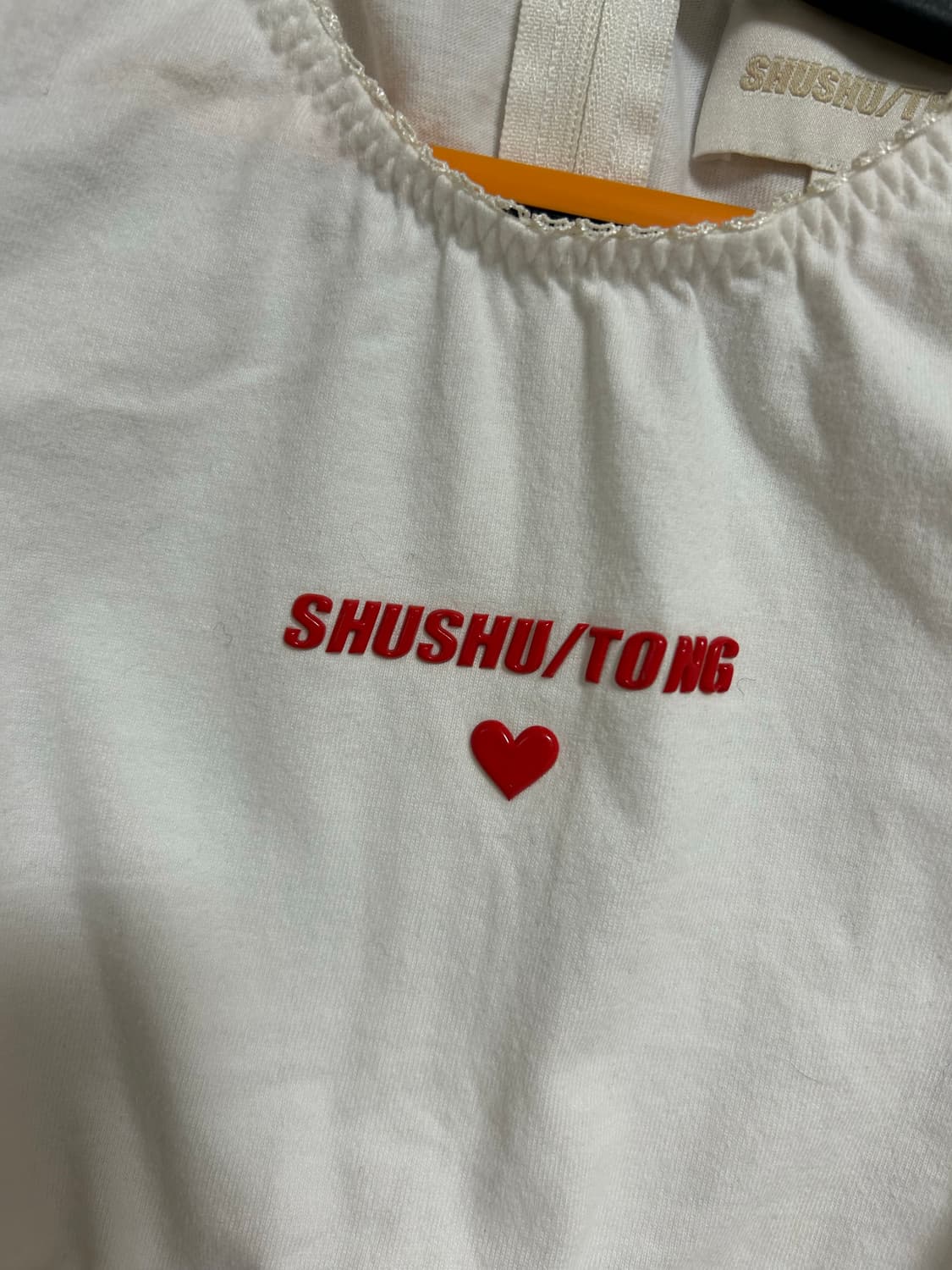 슈슈통 화이트 슬리브리스 탑 상품이미지7