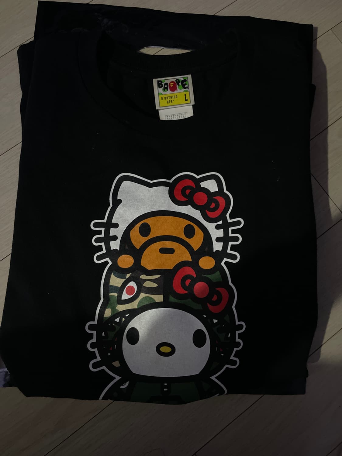 베이프x헬로키티 베이비마일로 블랙 티셔츠 L 국내판 상품이미지1