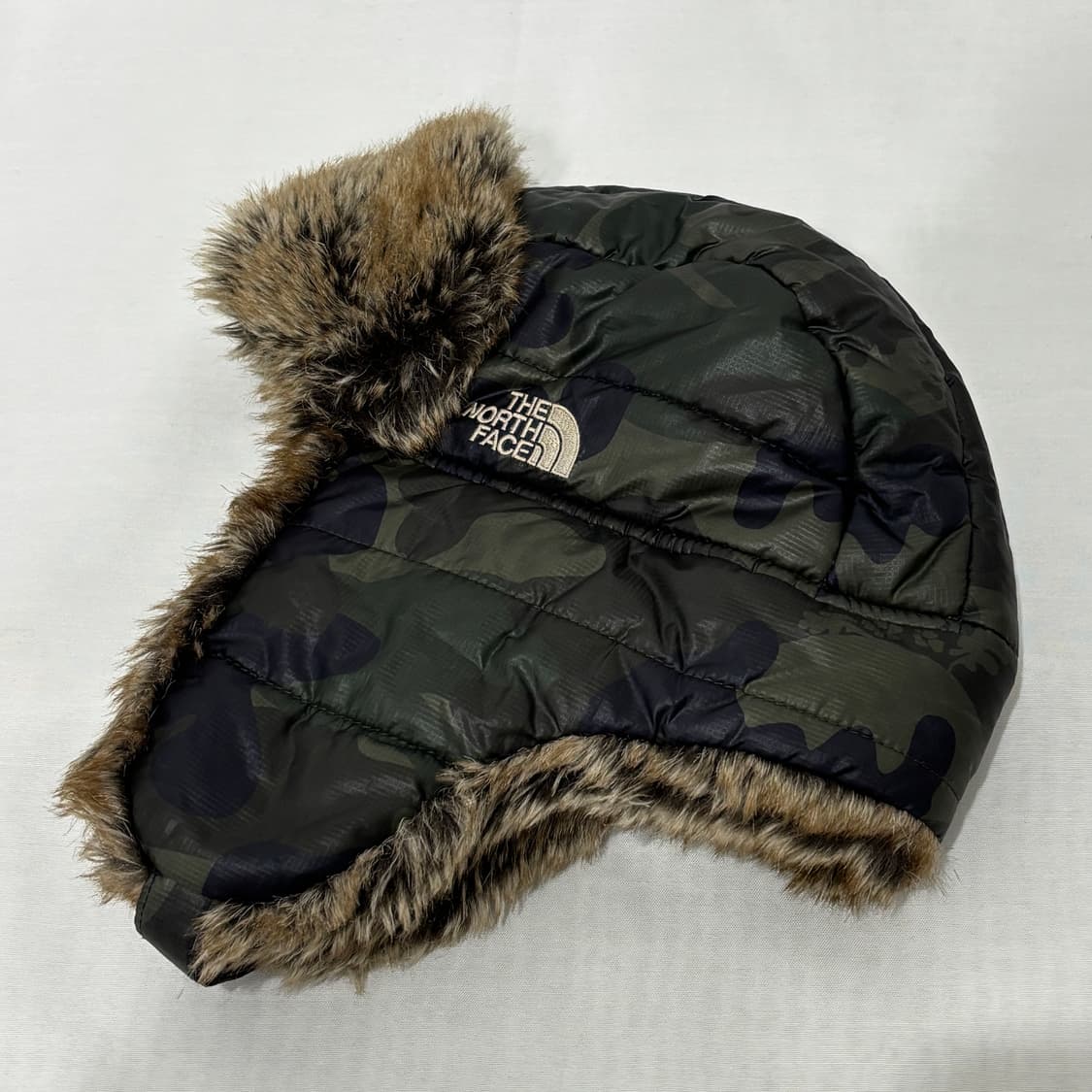 노스페이스 카모 플랩캡 트루퍼헷 모자 상품이미지1
