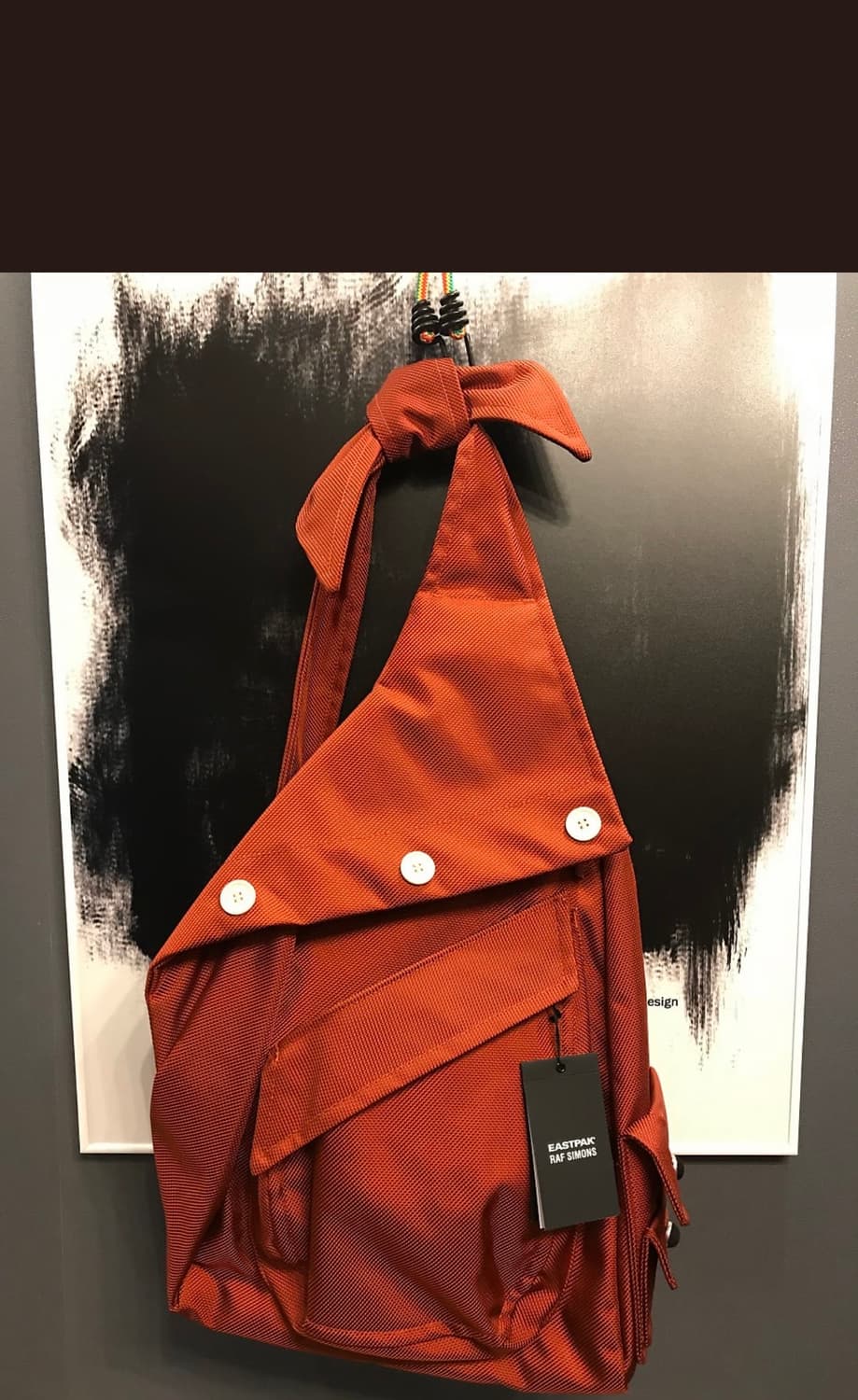 라프시몬스x이스트팩 슬링백 레드 상품이미지1