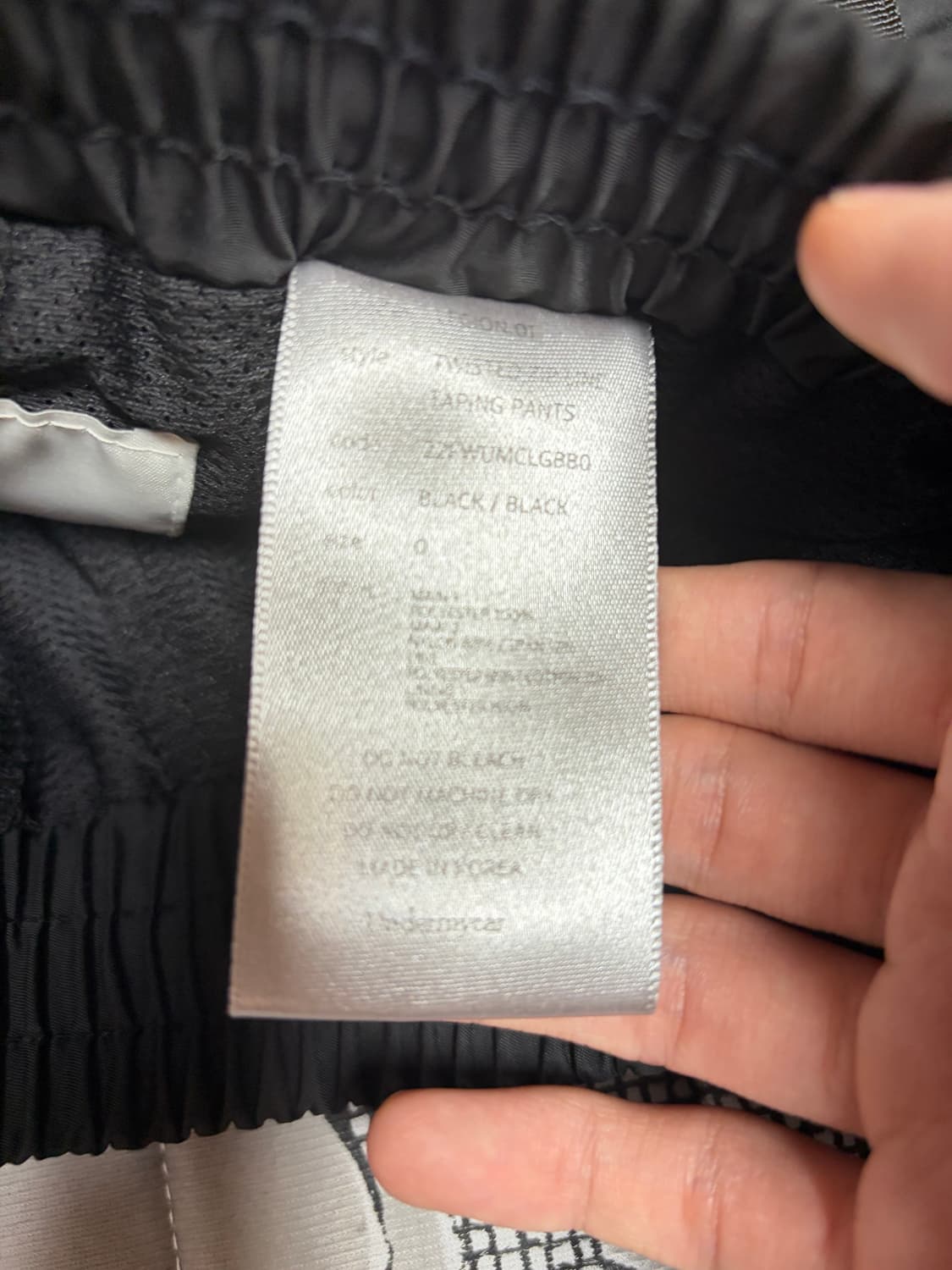 언더마이카 트위스트 지퍼 라인 테이핑 팬츠 0 상품이미지4