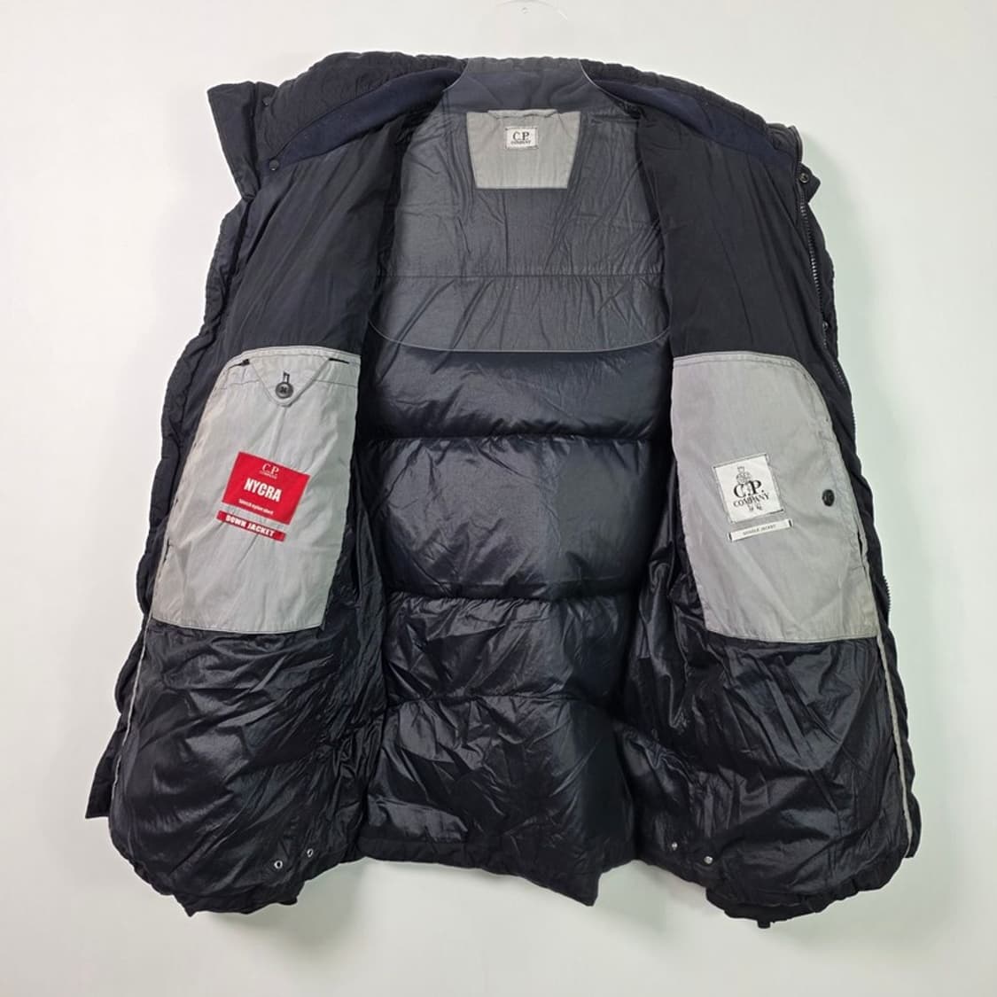 cp컴퍼니 나이크라 NYCRA 고글 후드 다운 패딩 블랙 L 상품이미지6
