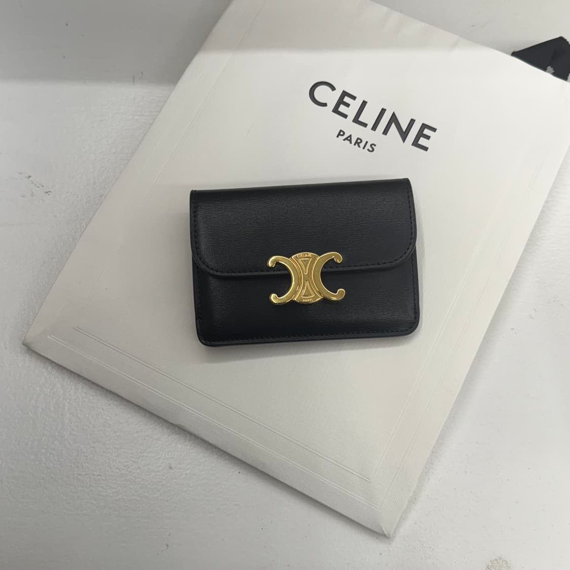 셀린느 트리옹프 플랩 카드지갑 블랙 상품이미지1