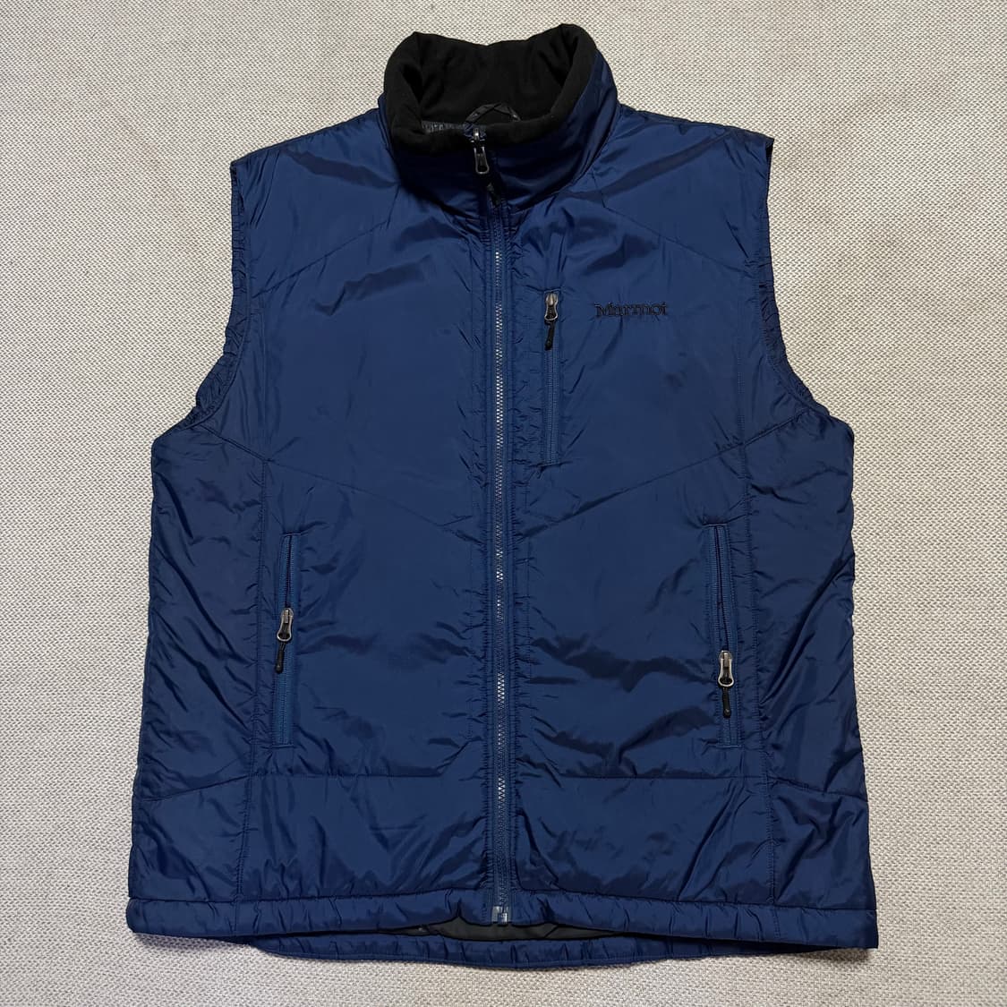마모트 MARMOT 경량패딩 조끼 상품이미지1