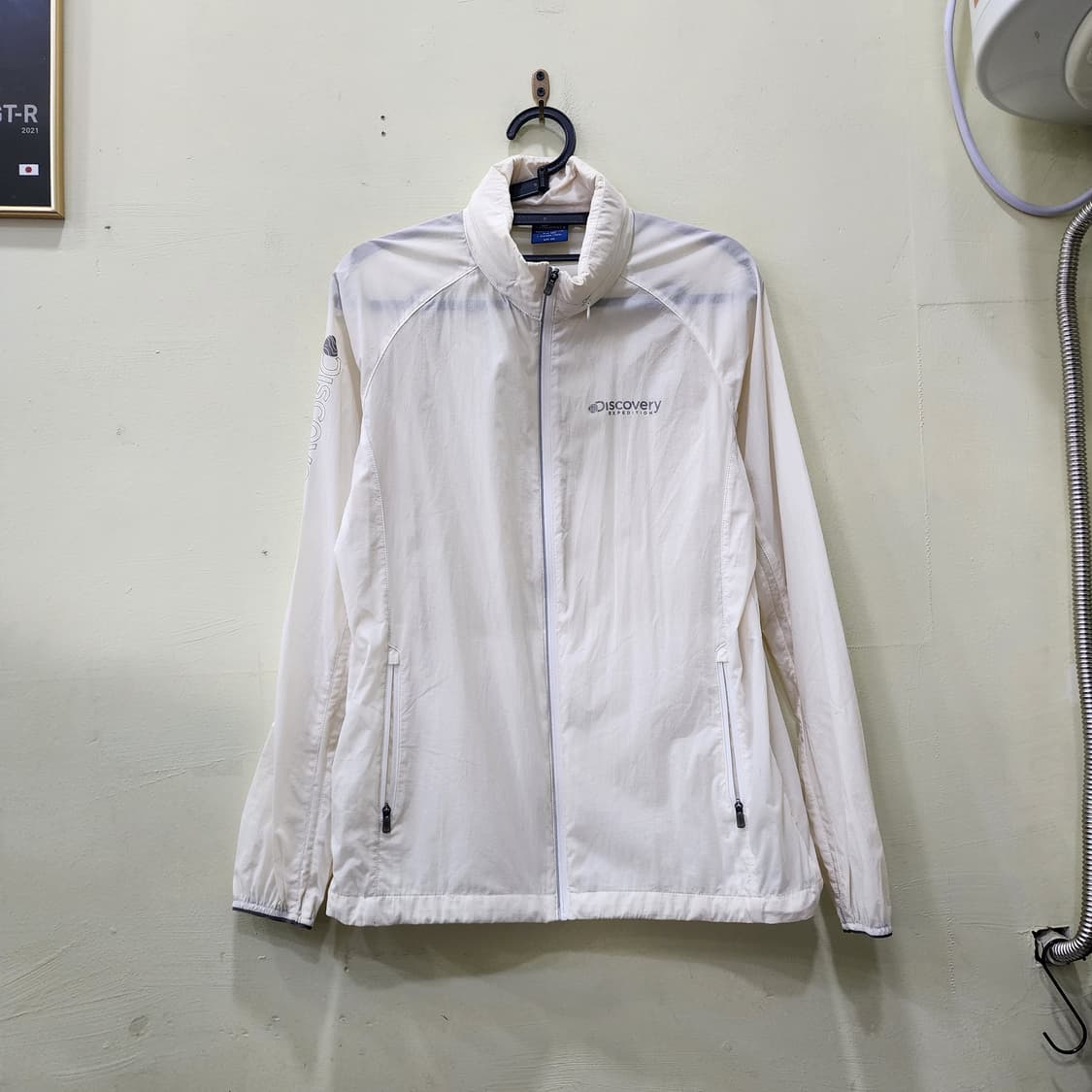 [100] 디스커버리 익스페디션 라이트 윈드 자켓 (오프화이트) 상품이미지1