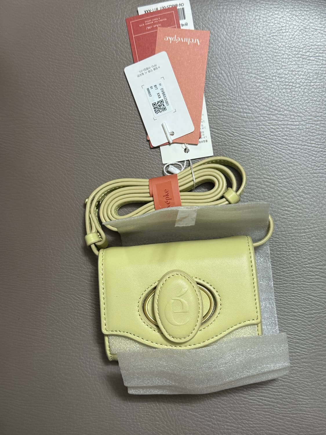 새상품) 아카이브앱크 오발카드백 버터 상품이미지1