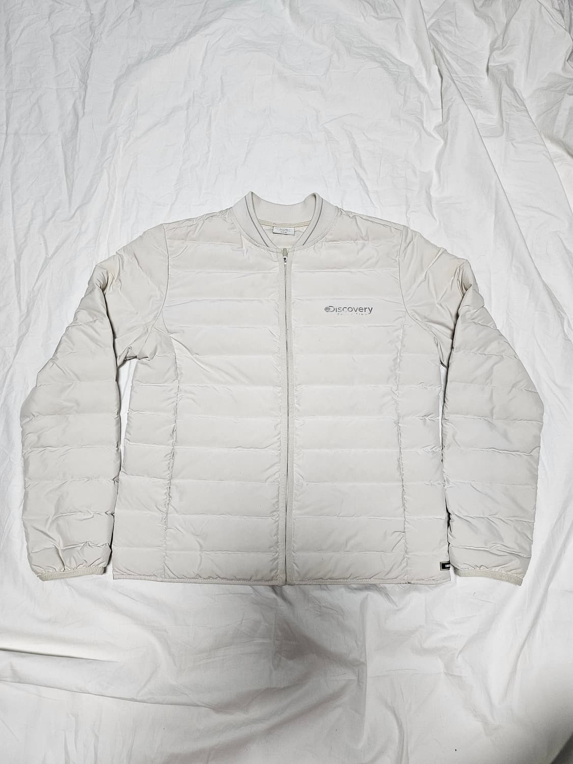 디스커버리 여성 구스다운 경량 패딩 95 상품이미지1