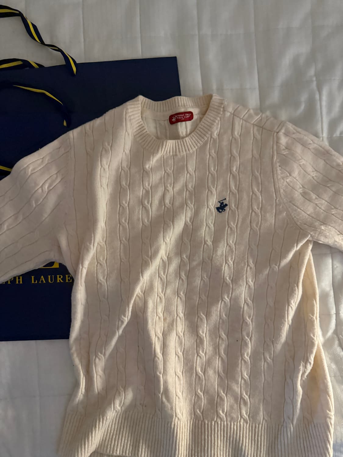 폴로 흰색 꽈베기 니트 상품이미지1
