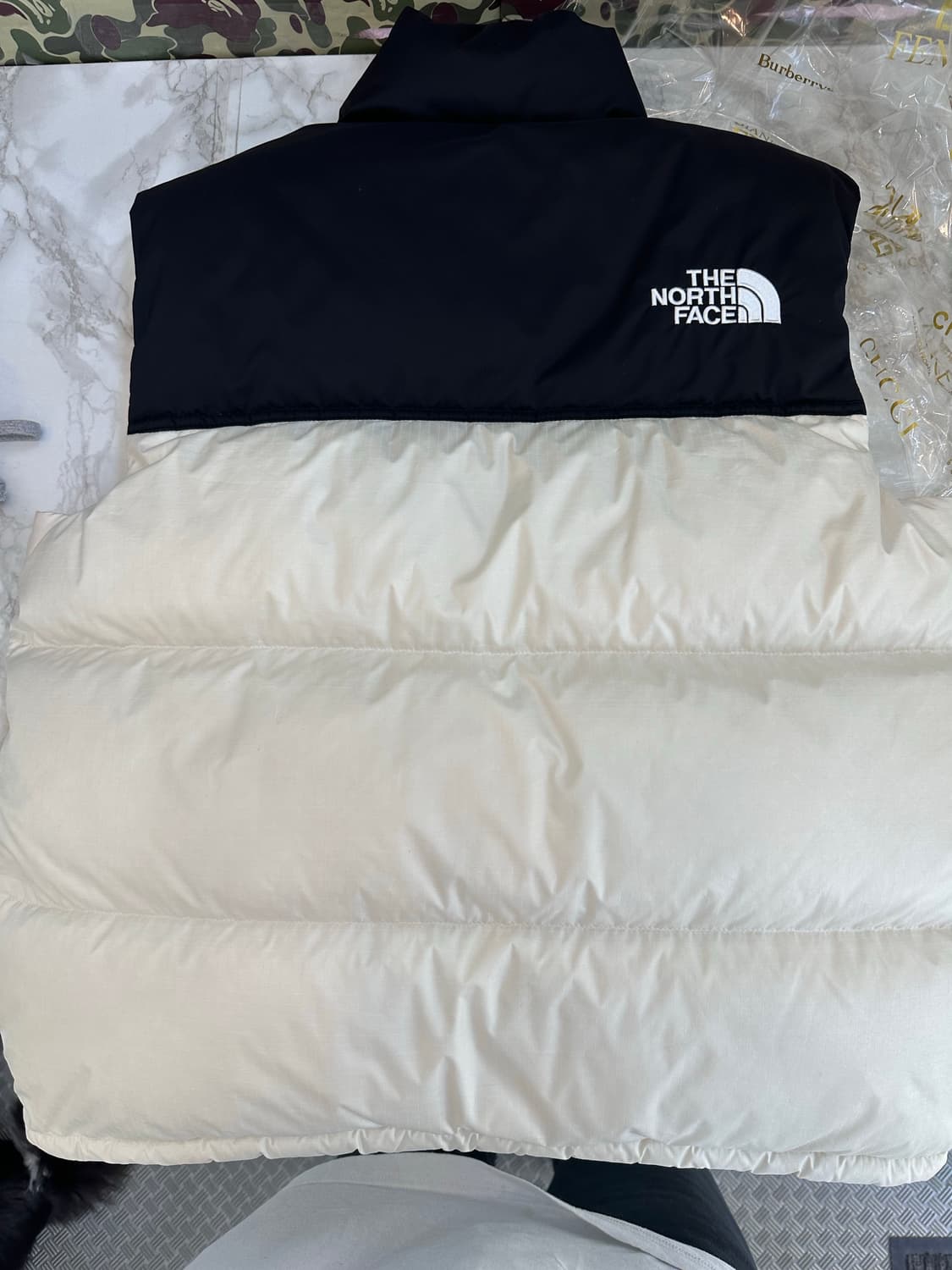 노스페이스 화이트 라벨 노벨티 눕시 다운 베스트 크림95M 상품이미지2