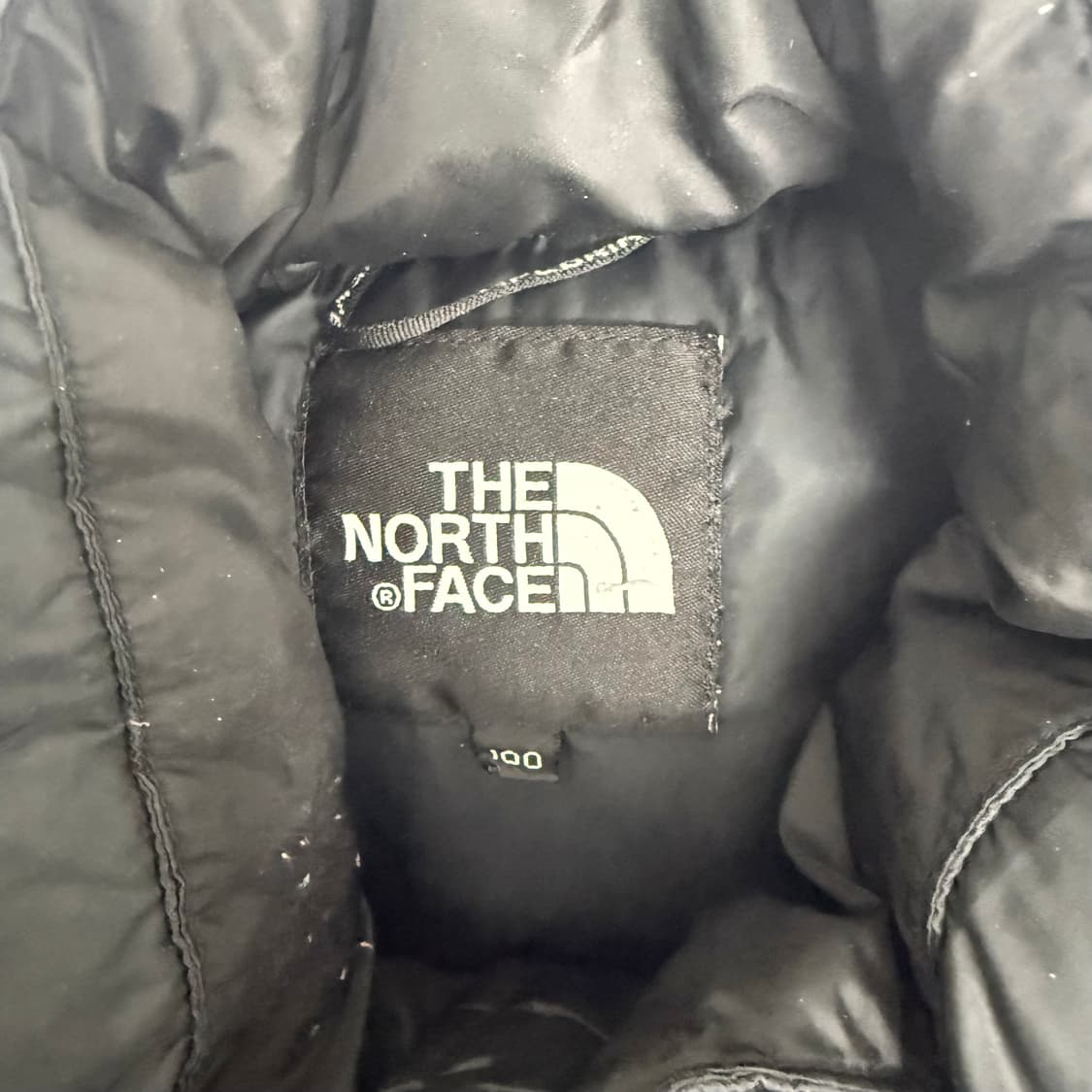 (100)노스페이스 구스다운 눕시 패딩 조끼 블랙 700 상품이미지4