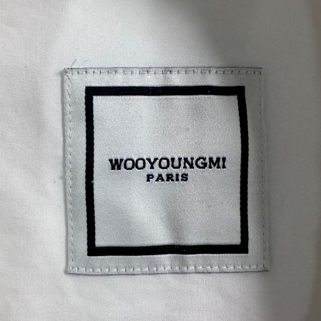 우영미 백로고 화이트 셔츠 상품이미지7