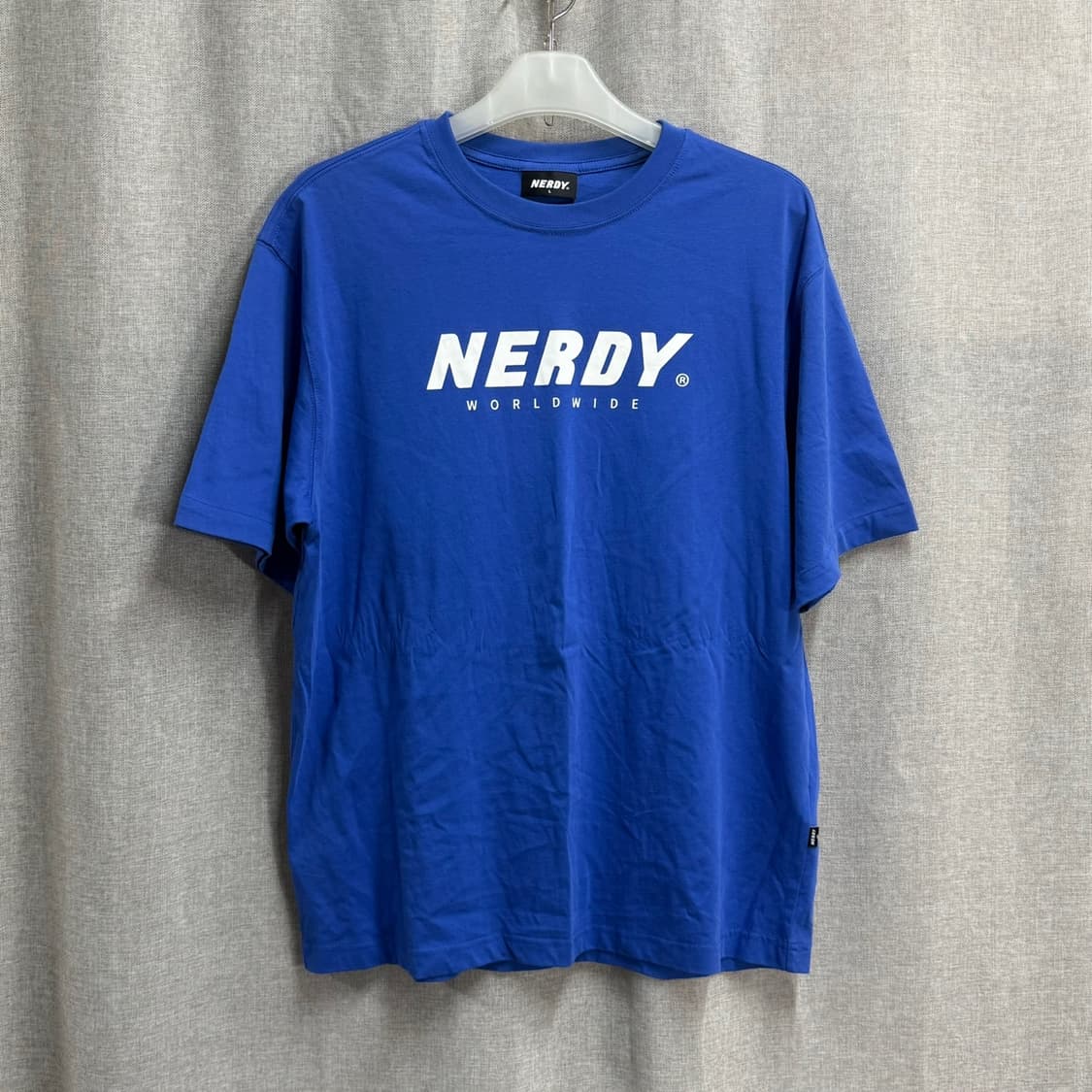 [L/오버핏] 널디(NERDY) 월드와이드 반팔 티셔츠 블루 상품이미지1