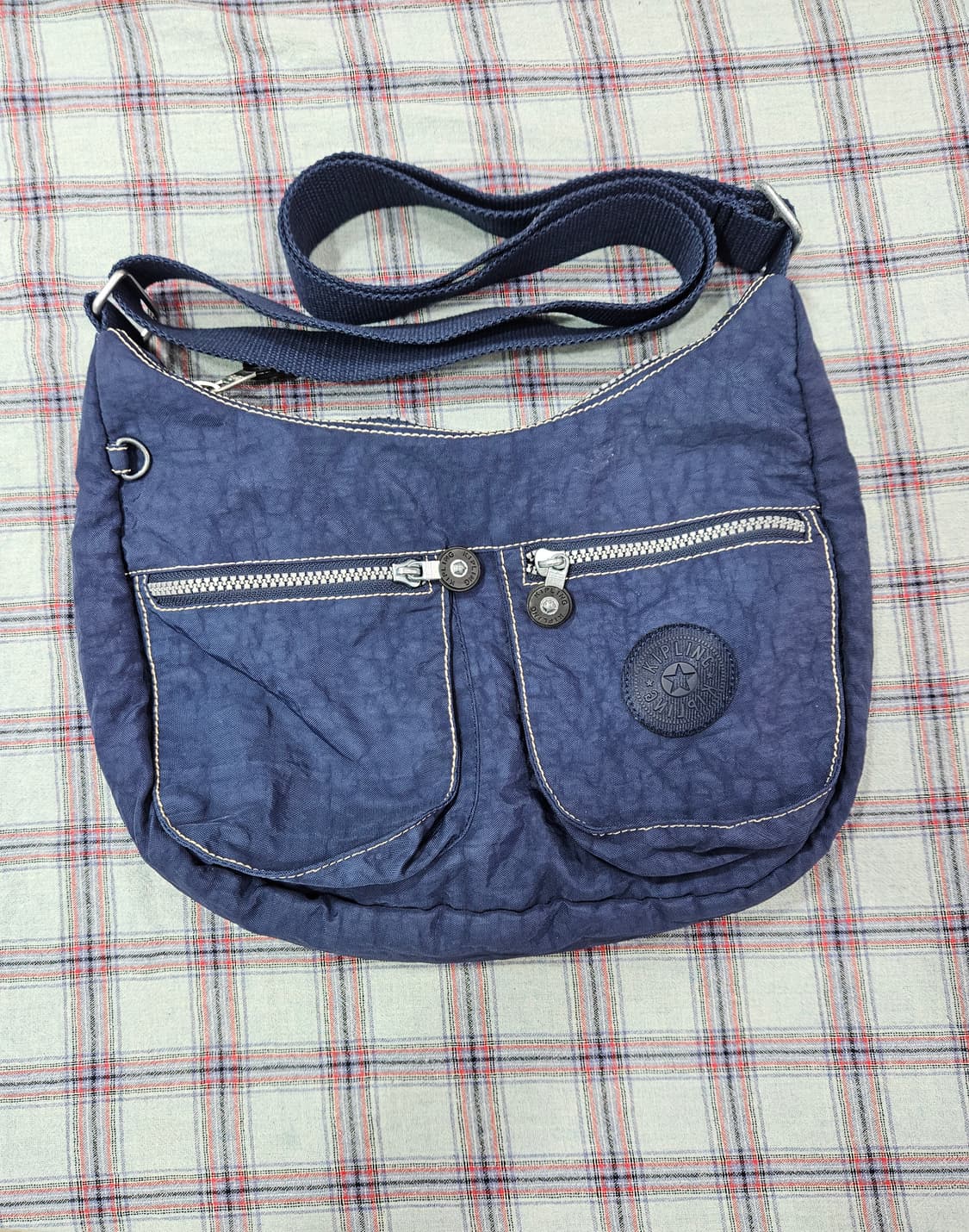 키플링(KIPLING) 반달형 투포켓 크로스백 상품이미지1