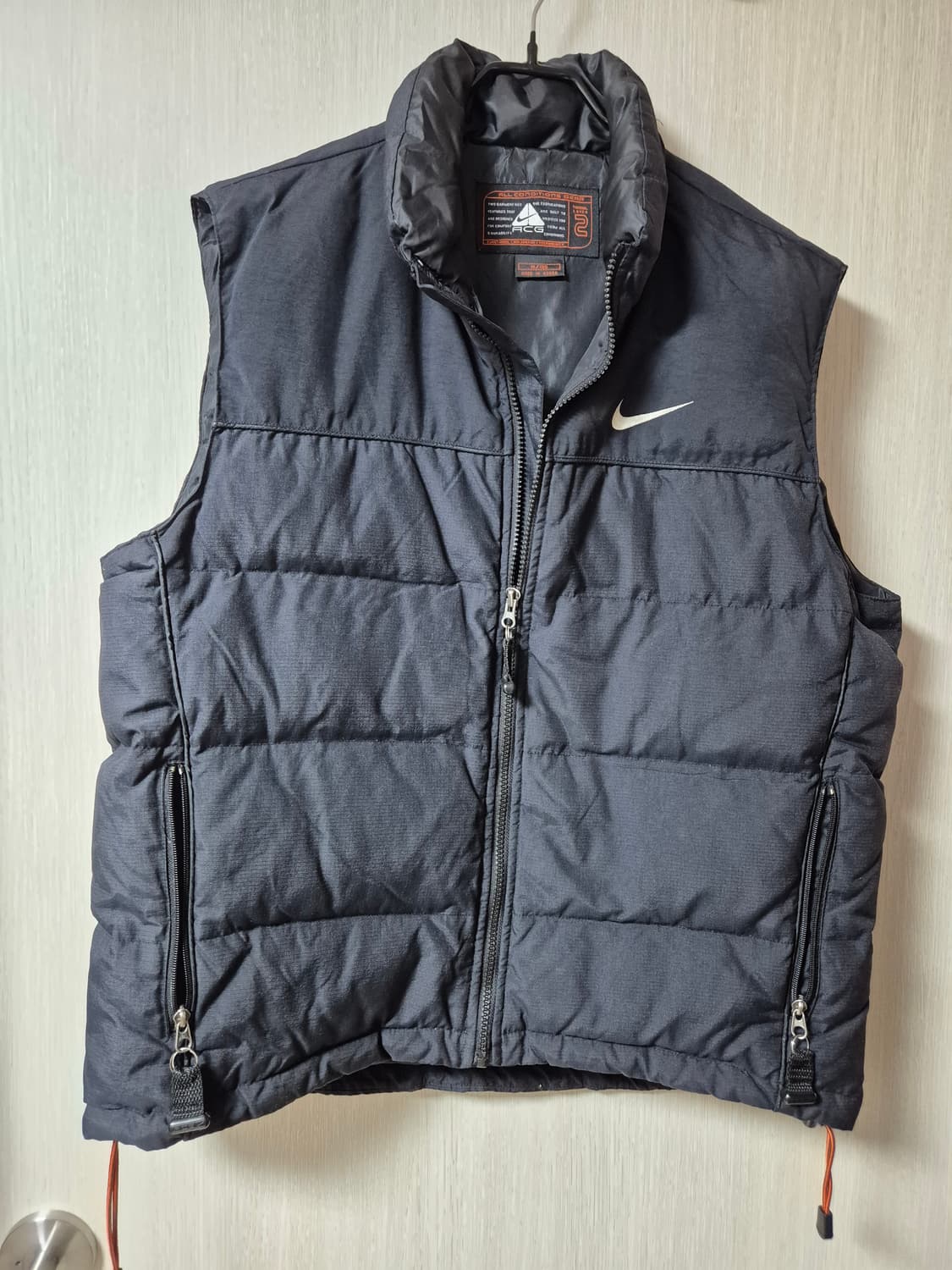 나이키 acg 블랙 로고 다운 패디드 베스트 100 패딩조끼 상품이미지1