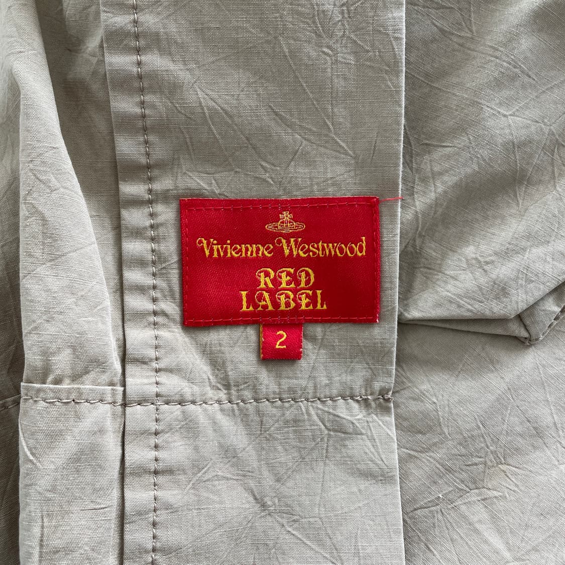 비비안웨스트우드 비대칭 베이지 면 코트 상품이미지9