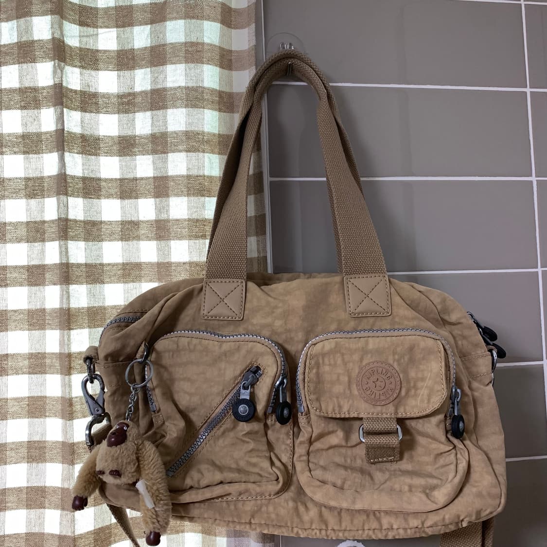 키플링 베이지색 가방 상품이미지1