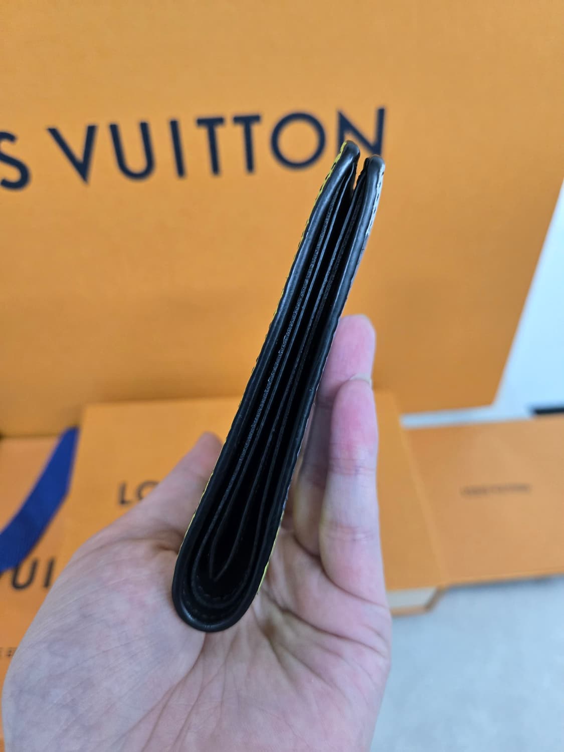 [보증서 정품] 루이비통 토뤼옹 반지갑 상품이미지2