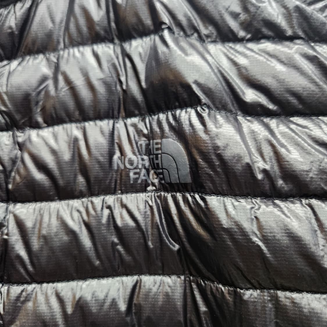 노스페이스 초 경량 구스다운 스트링 패딩 L 상품이미지3