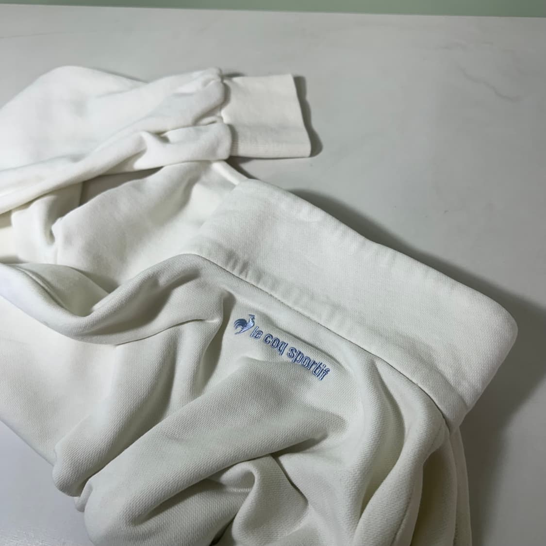 우먼M 르꼬끄 스포르티브 화이트 빅로고 반집업 크롭맨투맨 상품이미지5